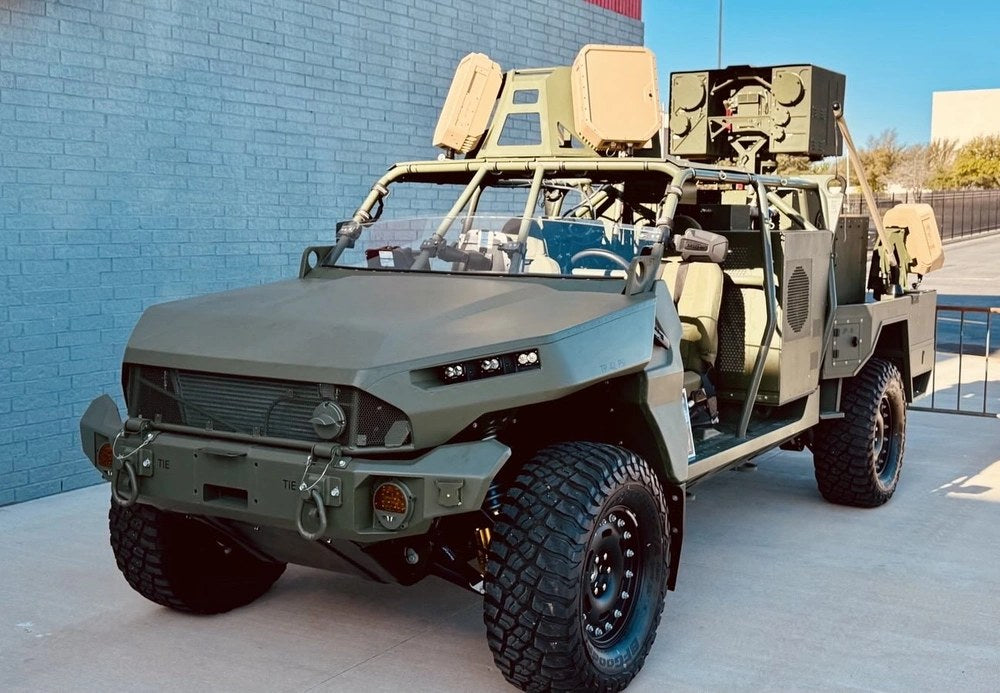 A U.S. Army M1301 Infantry Squad Vehicle equipped with a LOCUST Laser Weapon System is displayed at Fort Sill, Oklahoma, in April 2025. The Army has now awarded a $464.8 million agreement to move the newer LOCUST X3 high-energy laser system into