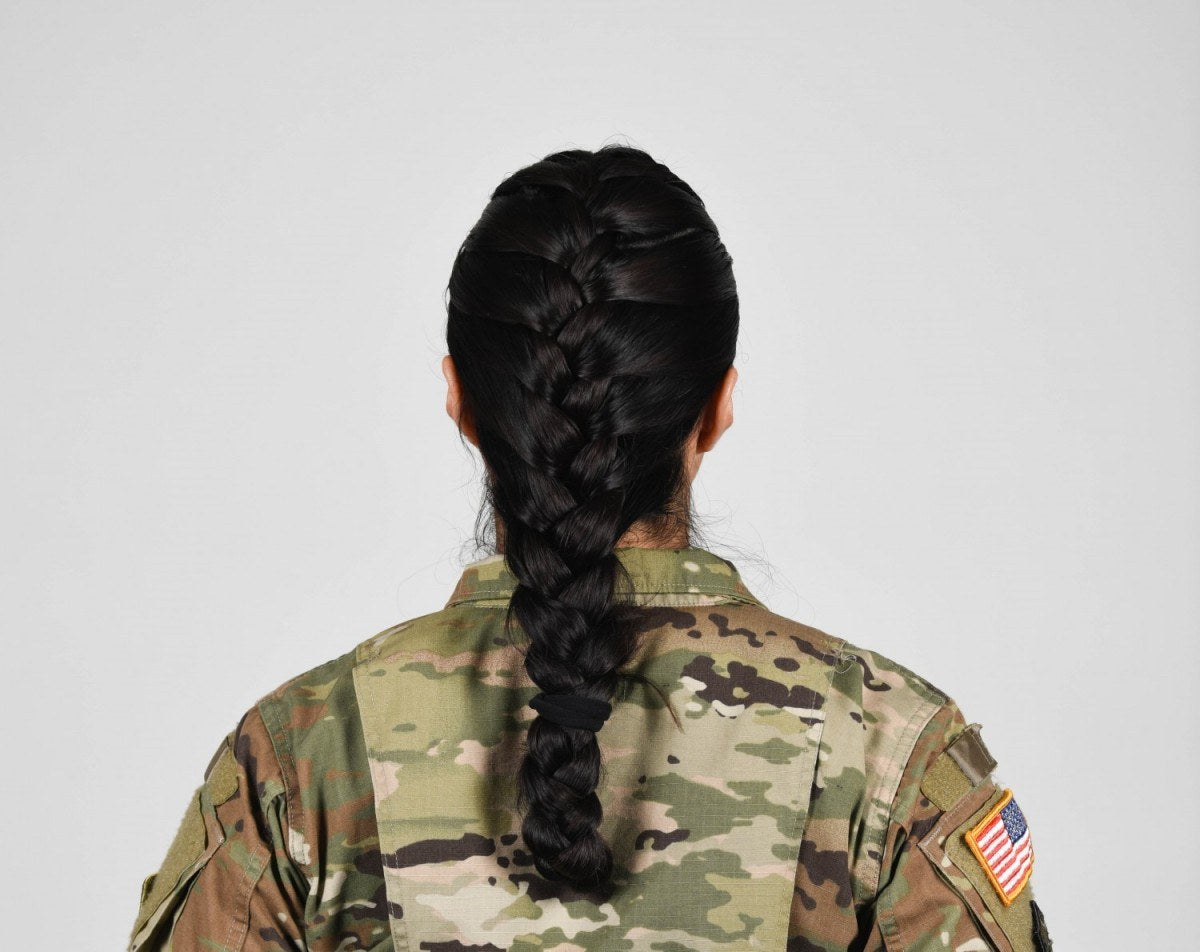 A U.S. Army soldier displays an approved braided hairstyle following changes to the Army’s grooming standards in 2021. Army hair regulations were reportedly at the center of an argument that prosecutors say escalated when a Georgia National Guardsman