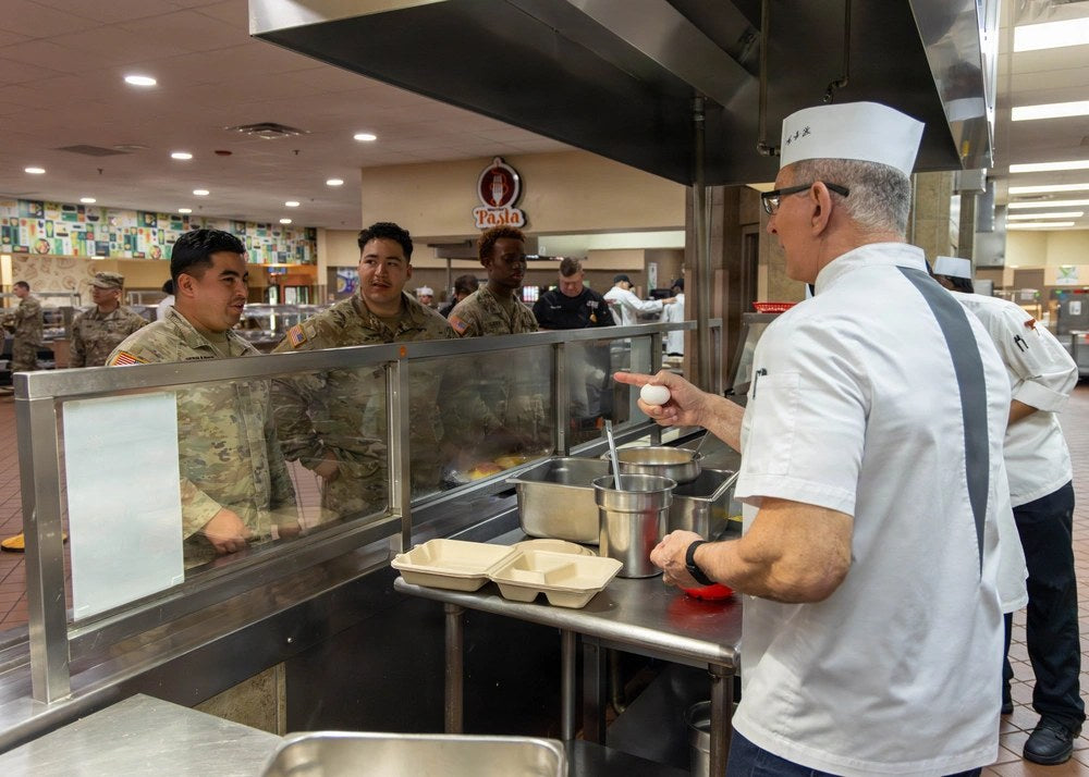 Illustrative file photo. Soldiers are served meals inside the Operation Iraqi Freedom Dining Facility at Fort Hood, Texas, on Feb. 18, 2026. The facility later closed after a major roach infestation was discovered. Fort Hood officials now say a hidden