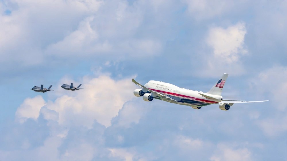 A U.S. Air Force VC-25B Bridge aircraft flies with two F-35A Lightning IIs near Joint Base Andrews, Maryland, Aug. 23, 2026. (U.S. Air Force photo by 1st Lt. Christopher Guerra)