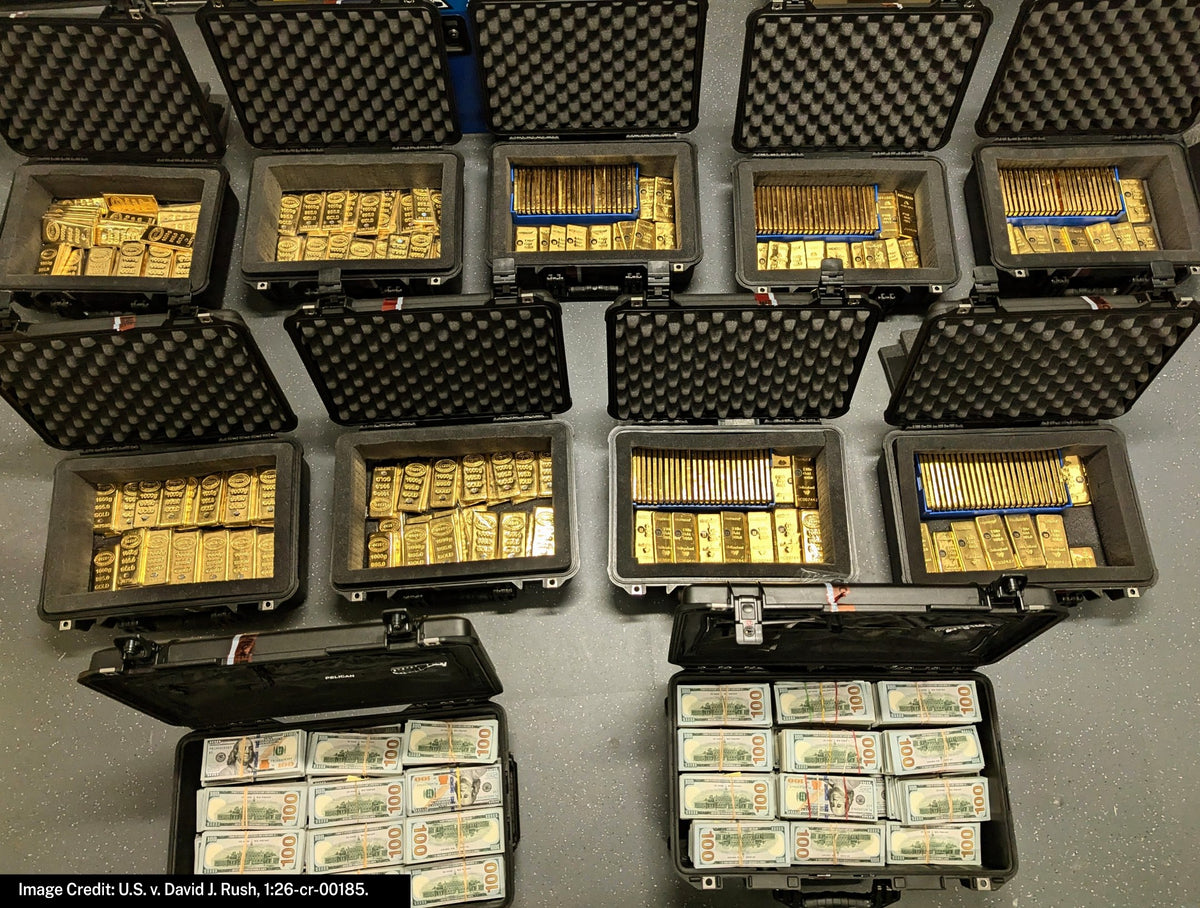 Gold bars and cash recovered by the FBI during a search of former senior CIA official David Rush’s Virginia home in May 2026. Rush pleaded guilty Oct. 6 to wire fraud in a scheme that prosecutors say cost the federal government approximately $194