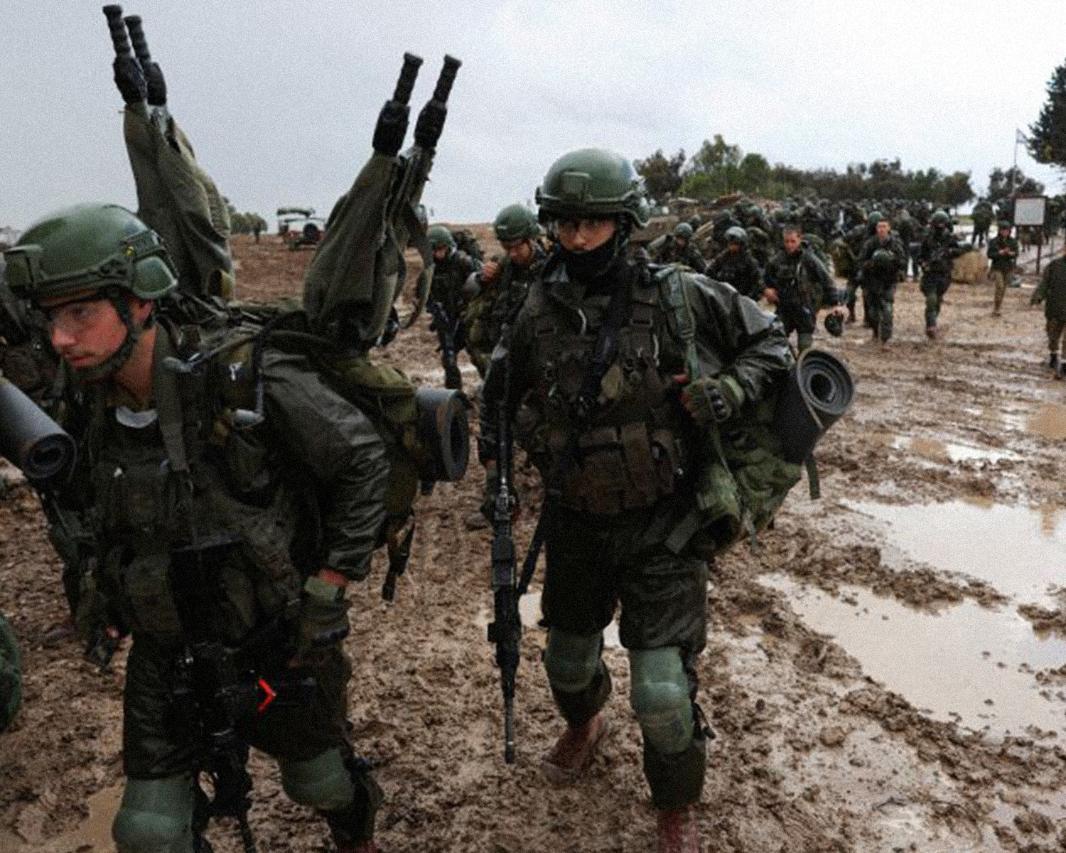 Thousands of Israeli reservists report for duty, as military chief clashes with ministers