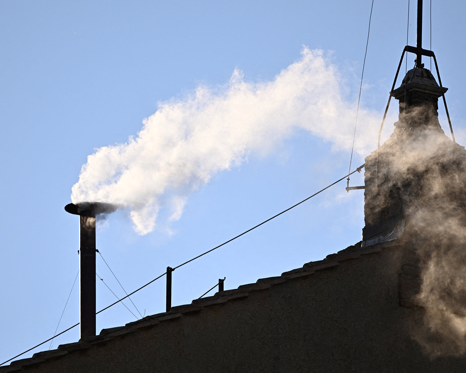 Catholic cardinals elect new pope, white smoke billows from Sistine Chapel