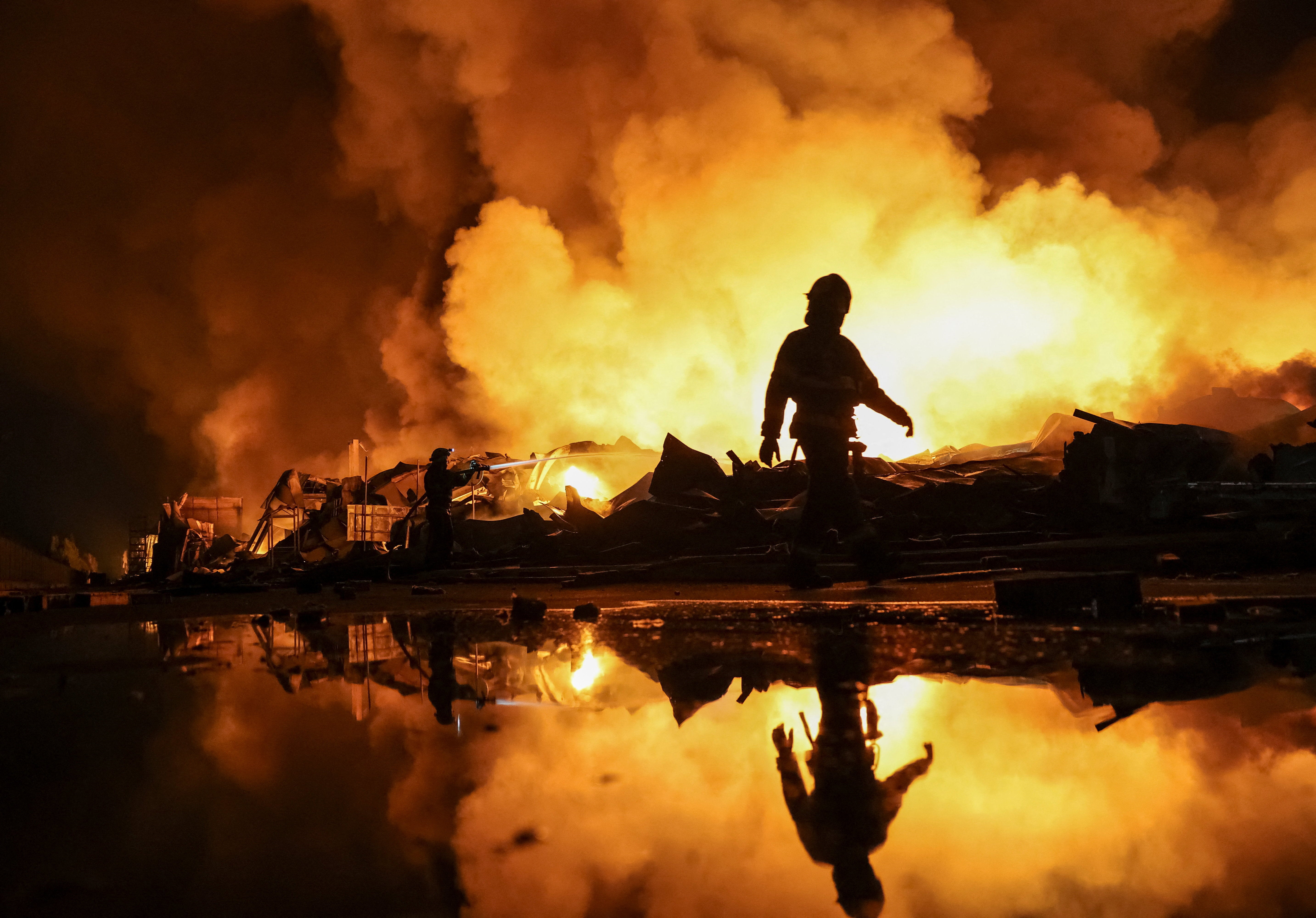 Firefighters work at a site of a Russian missile strike, amid Russia's attack on Ukraine, in Kyiv region, Ukraine, August 5, 2026. REUTERS/Anatolii Stepanov