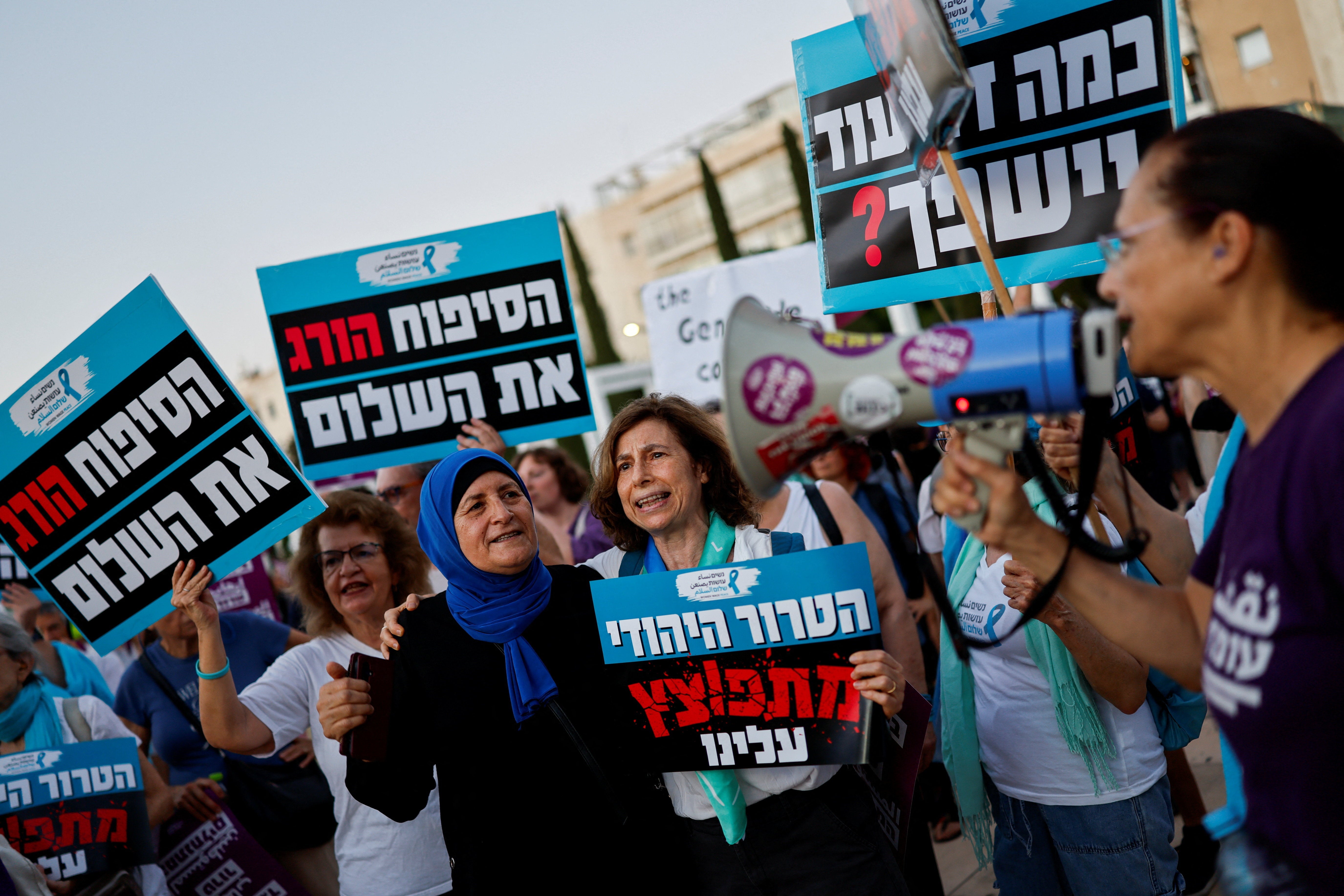 Activists protest violence committed by Israeli settlers against Palestinians in the occupied West Bank, in Tel Aviv, Israel, July 28, 2026. REUTERS/Amir Cohen