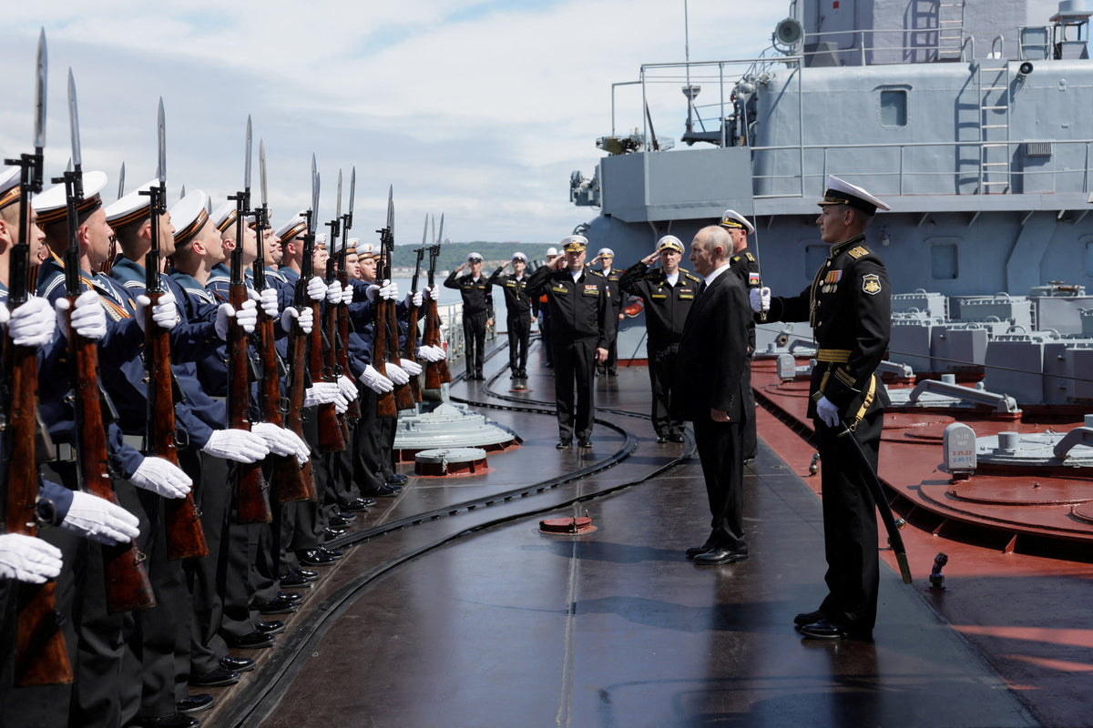 Russian President Vladimir Putin is welcomed on board a missile cruiser “Varyag” as he observes a military drill of Pacific fleet, in Russia's far eastern Sakhalin Region, Russia, August 12, 2026. Sputnik/Gavriil Grigorov/Pool via REUTERS