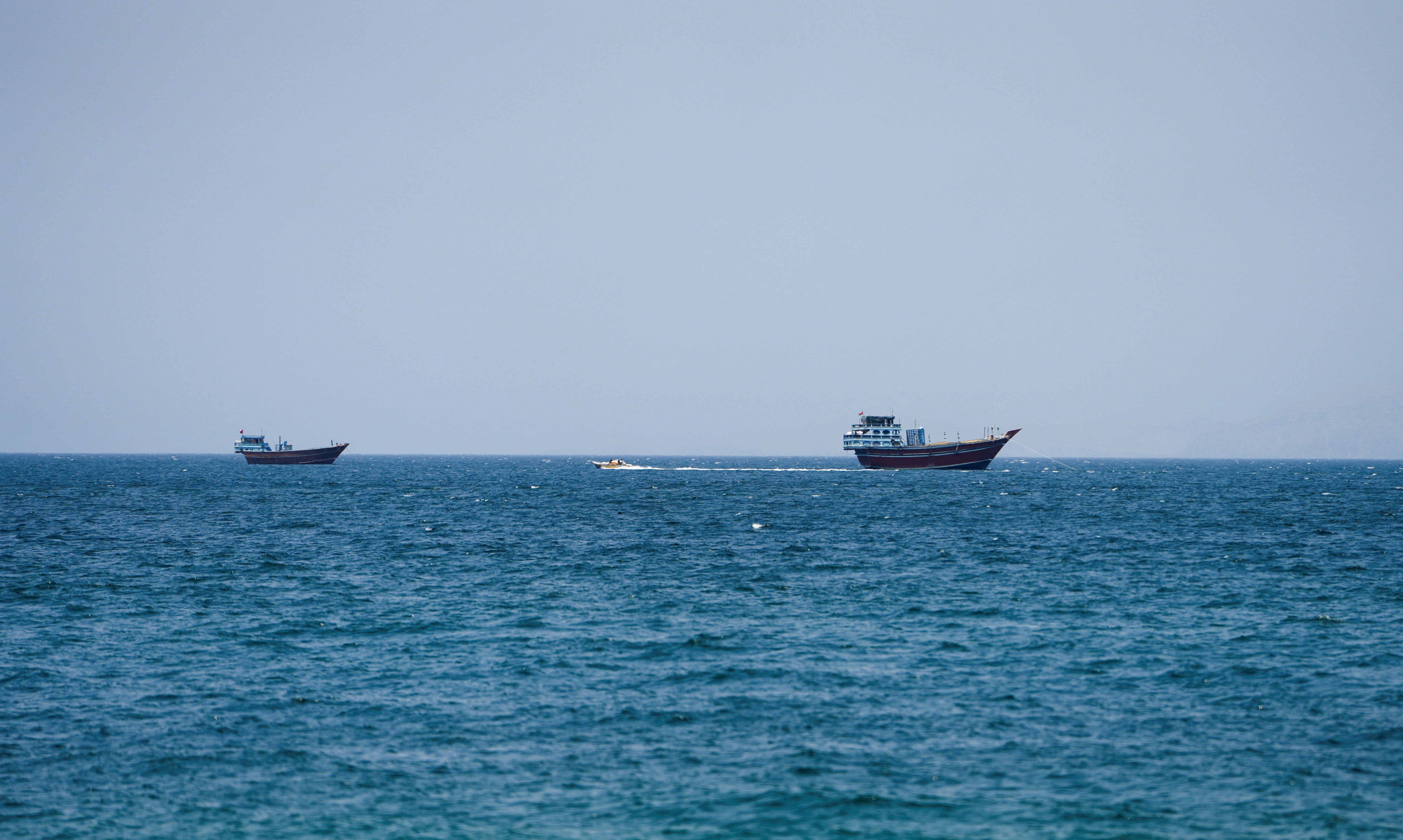 Vessels at the Strait of Hormuz, as seen from Musandam, Oman, July 26, 2026. REUTERS/Stringer