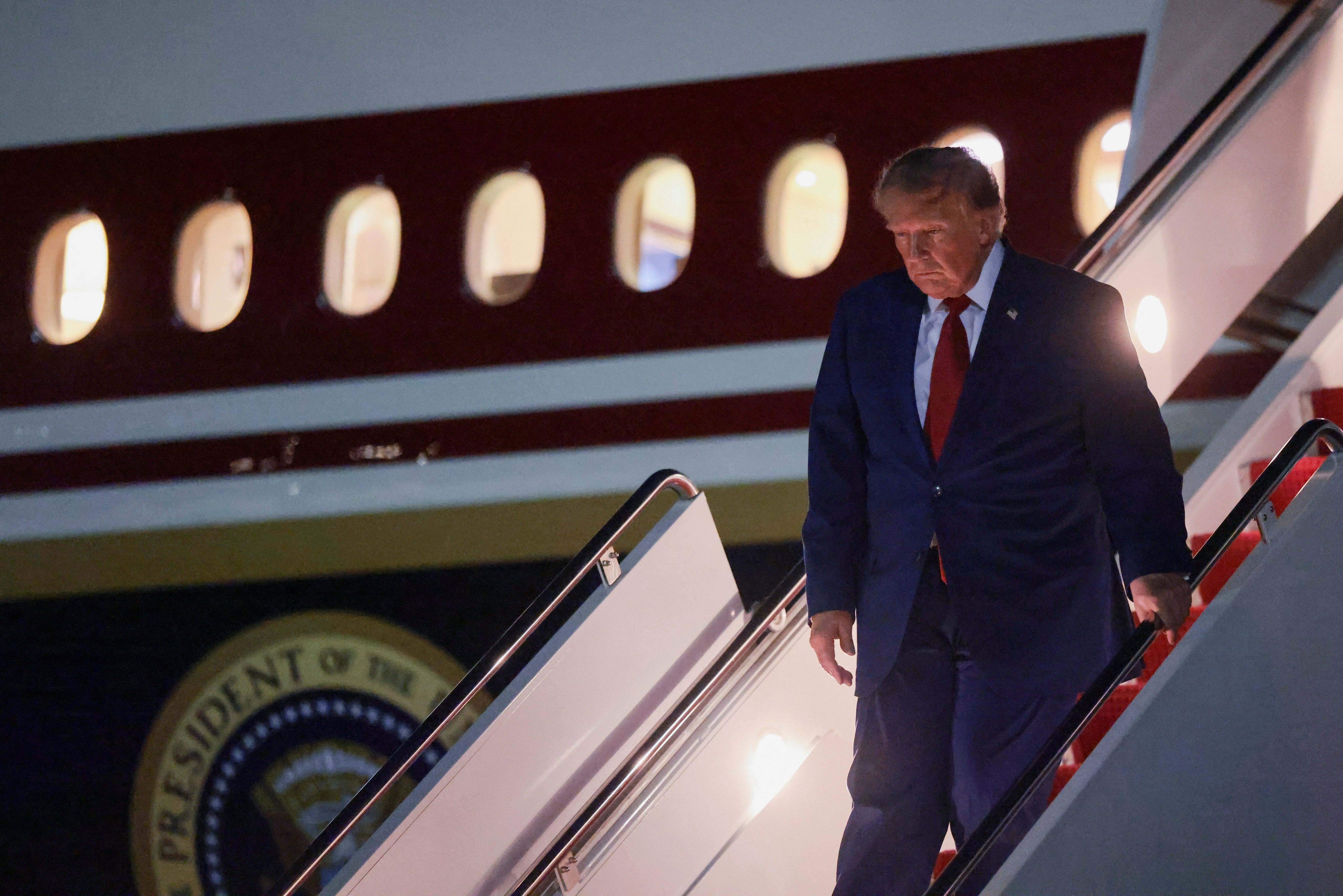 U.S. President Donald Trump disembarks Air Force One at Joint Base Andrews, Maryland, U.S., August 11, 2026. REUTERS/Kylie Cooper