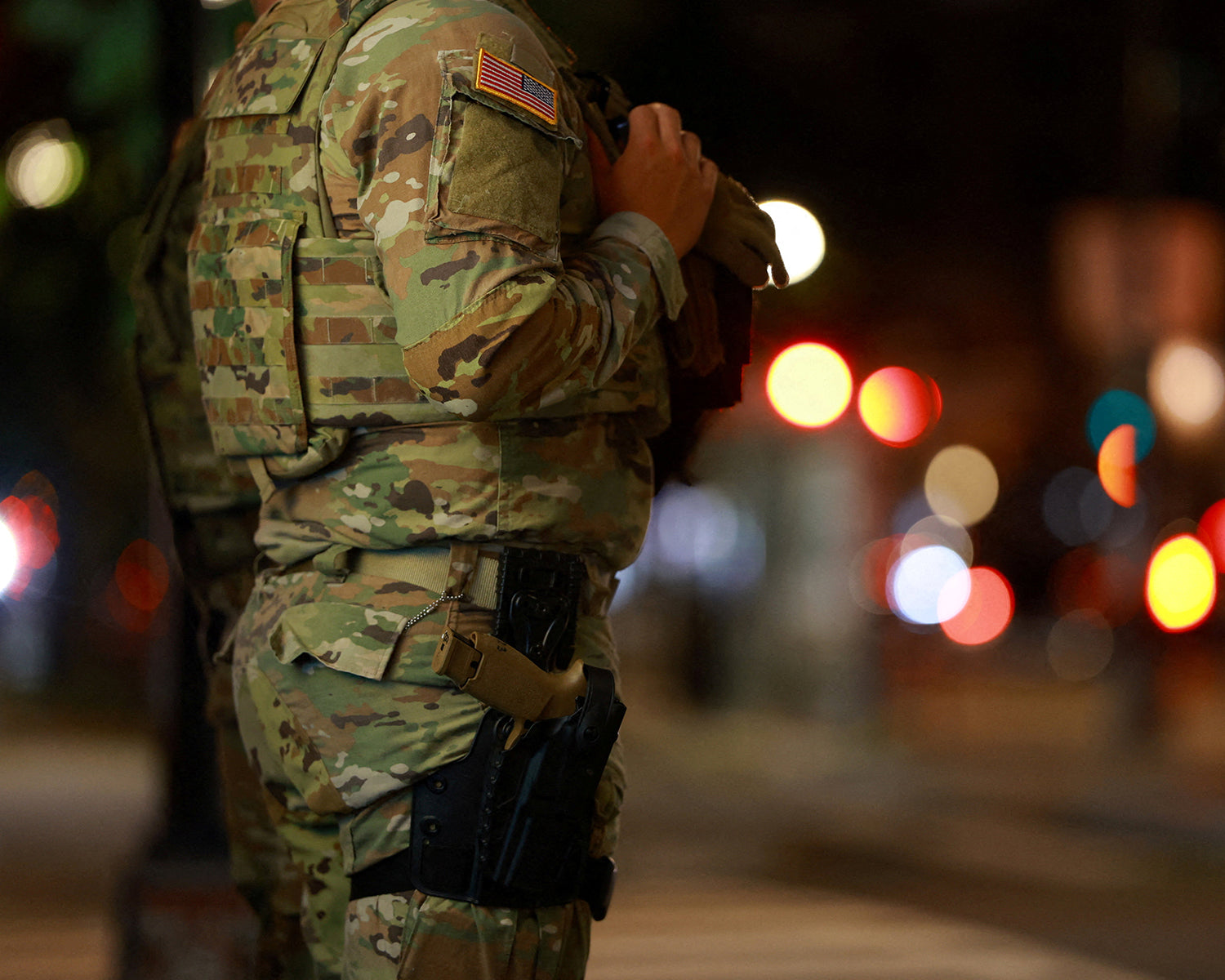 US National Guard troops in Washington to begin carrying weapons, officials say