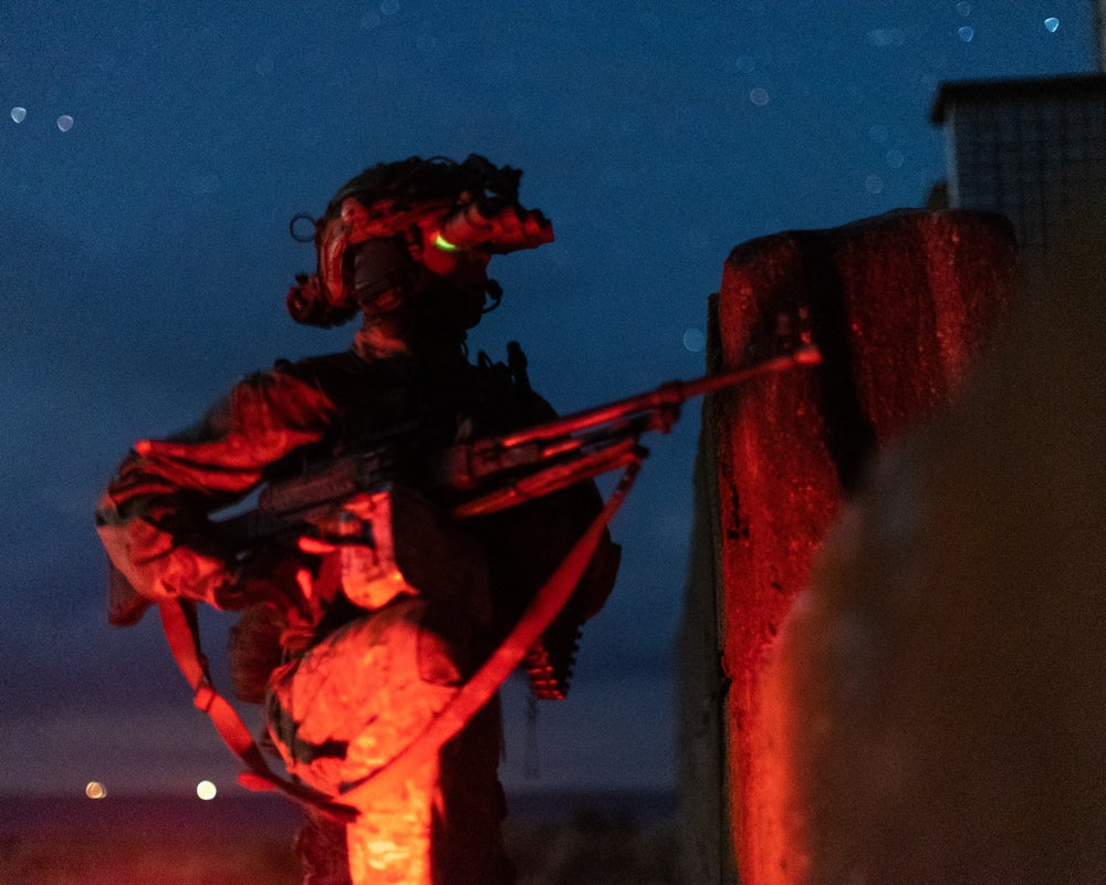 A Ukrainian Special Forces soldier provides security for a joint raid exercise between Ukrainian Special Forces and U.S. Navy SEALs