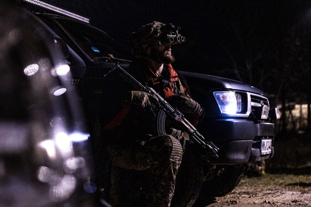 A Ukrainian Special Operations Forces (SOF) soldier pulls security for a convoy escorting simulated downed UH-60