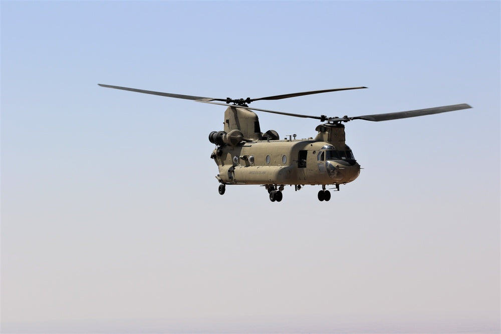 A U.S. CH-47 Chinook helicopter is seen transporting personnel and equipment to forward operating bases in Syria