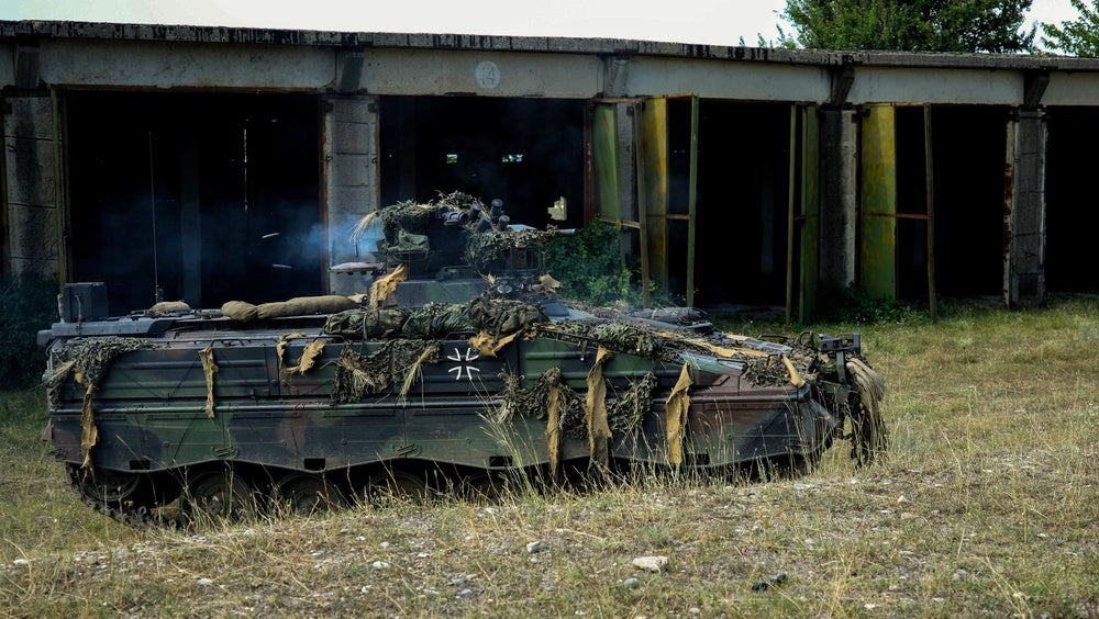A German army Marder infantry fighting vehicle with the 391st Mechanized Infantry Battalion lays suppressive fire at Vaziani Training Area, Georgia