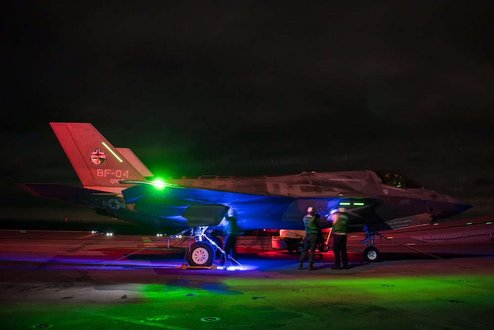 F-35 Lightning fighter jets confuct night flying trials off the United Kingdom’s HMS Queen Elizabeth.
