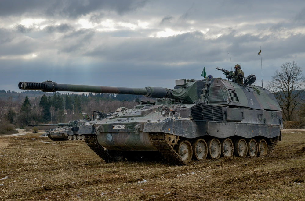 German soldiers of 1-31 Battalion fire the PzH 2000 (Panzerhaubitze) self-propelled Howitzer during a joint operations with the Field Artillery Squadron