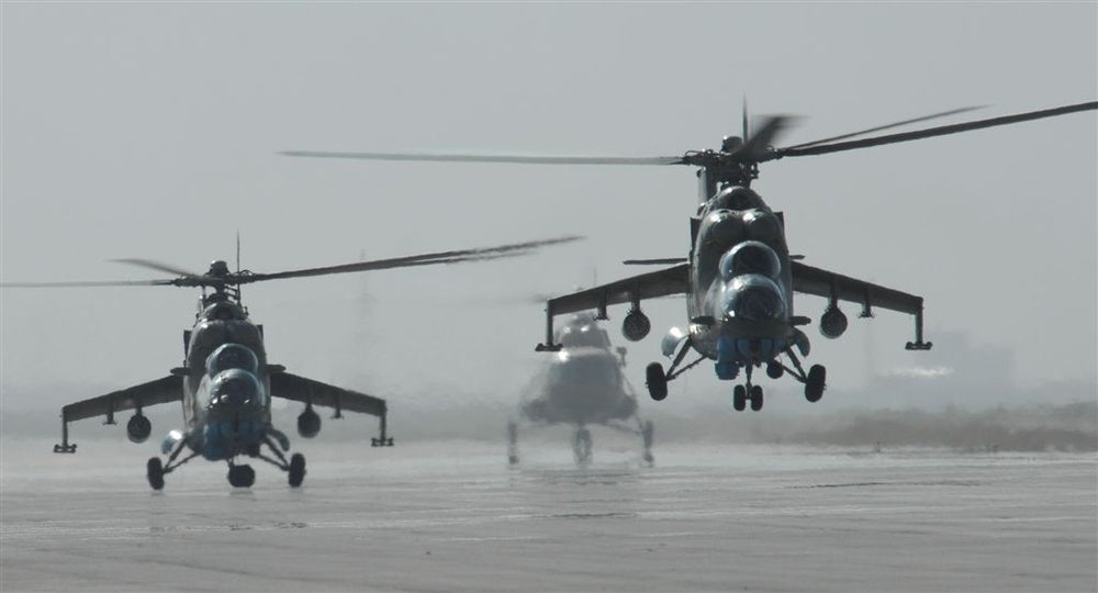 Illustrative photo of two Mi-35 attack helicopters via U.S. Defense Visual Information Distribution Service