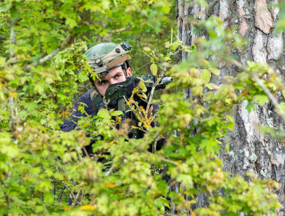 A Kosovo Security Force Soldier pulls security in defense of an area during Combined Resolve 18 at Hohenfels Training Area