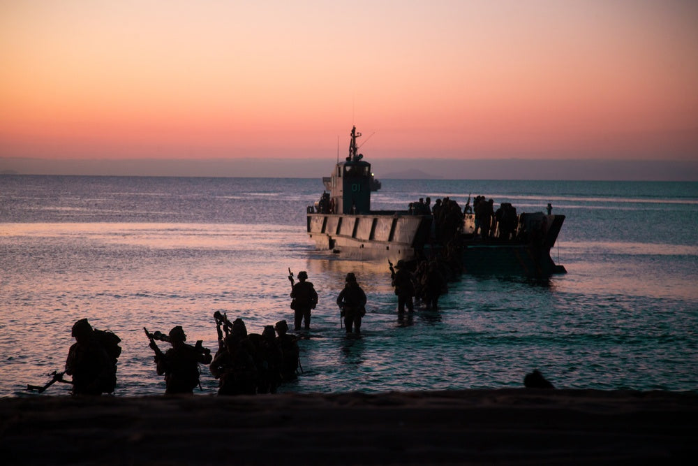 U.S. Marines with 1st Battalion, 7th Marine Regiment, take part in an amphibious landing