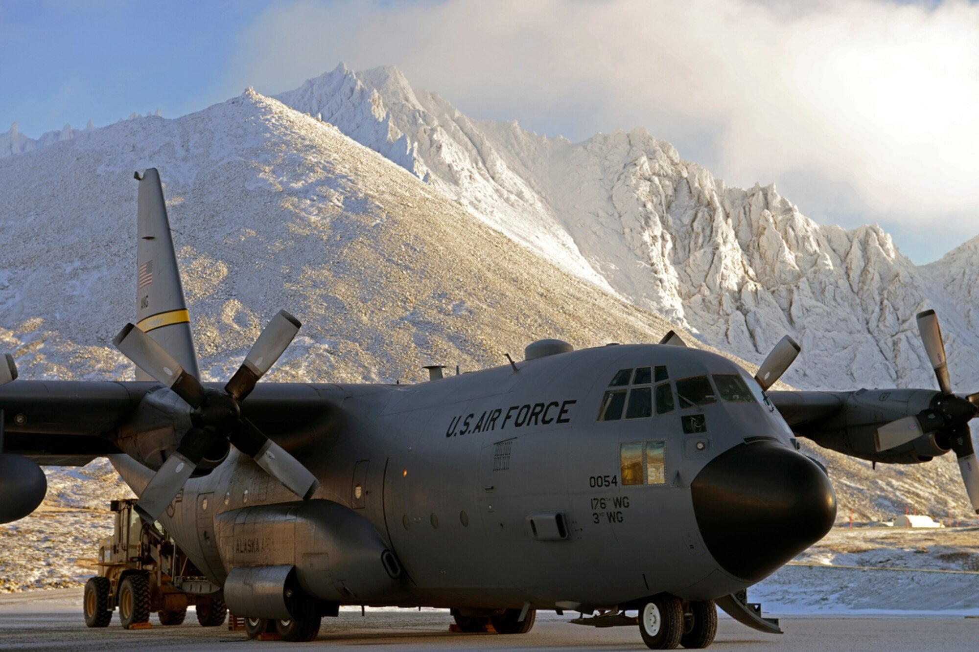 Illustrative file photo — A U.S. Air Force C-130 Hercules operates at Cape Newenham, Alaska, during a resupply mission in December 2012. A civilian Cessna 441 crashed near the same remote military airfield on Aug. 20, 2026. U.S. Air Force photo by Tech.