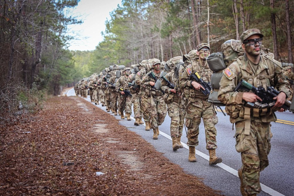 U.S. Army trainees conduct a 12-mile ruck march at Fort Moore, Georgia, Jan. 11, 2024. U.S. Army photo by Capt. Stephanie Snyder.
