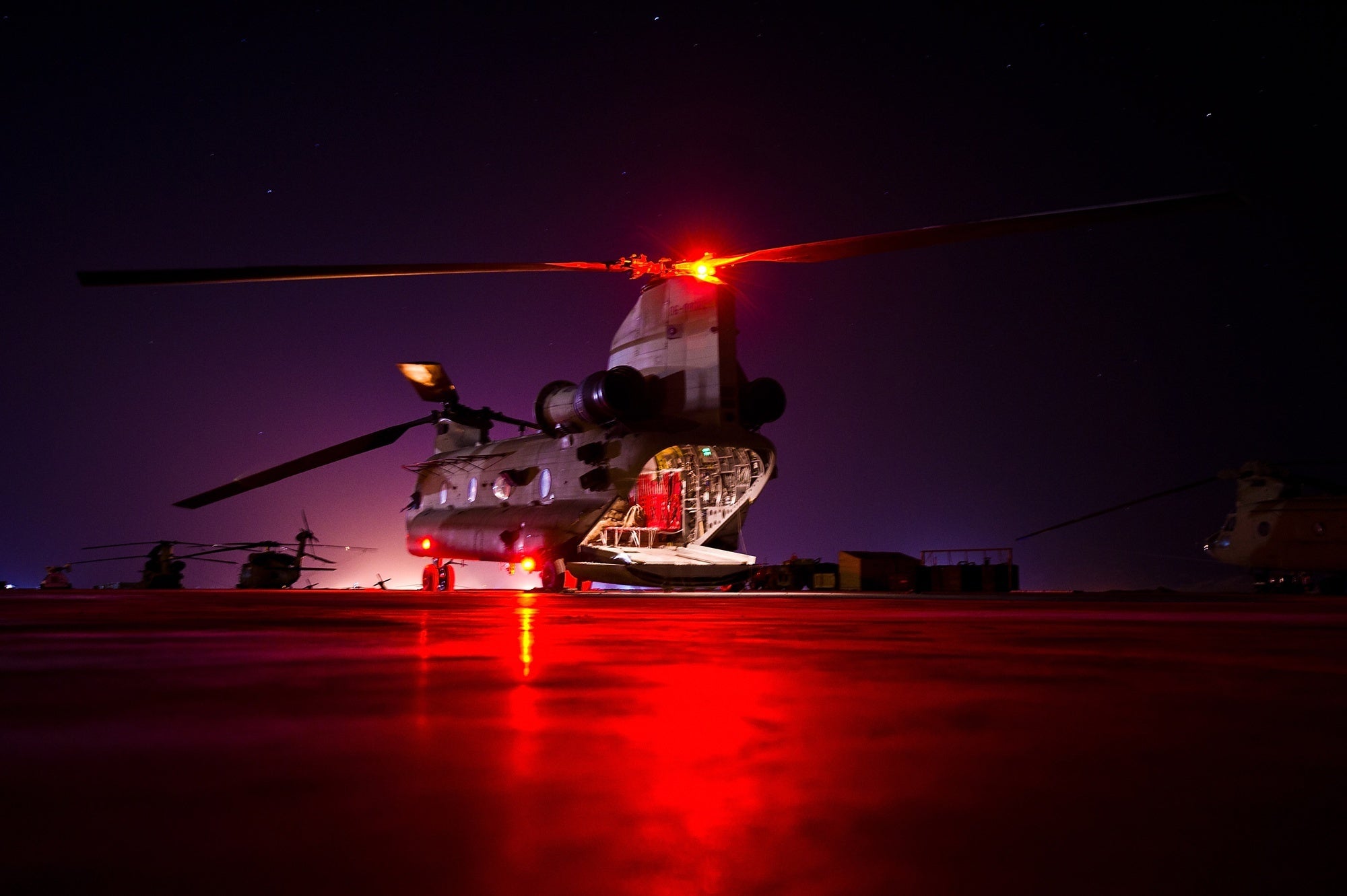 Illustrative photo: U.S. pilots assigned to Company B, Task Force Lobos, 1st Air Cavalry Brigade, 1st Cavalry Division, run up a CH-47F Chinook helicopter for a night mission