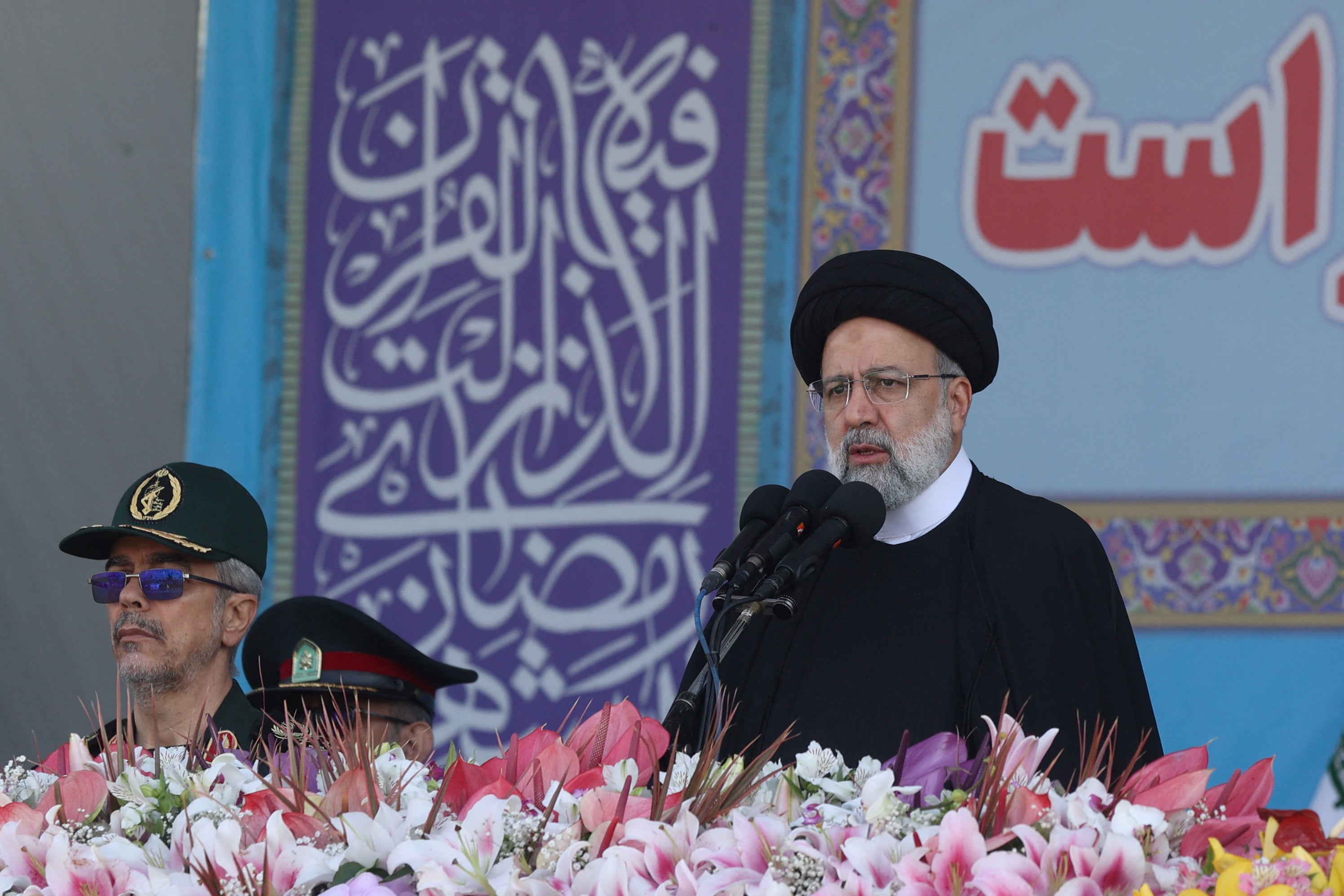 Iranian President Ebrahim Raisi delivers a speech during the ceremony of the National Army Day parade in Tehran, Iran