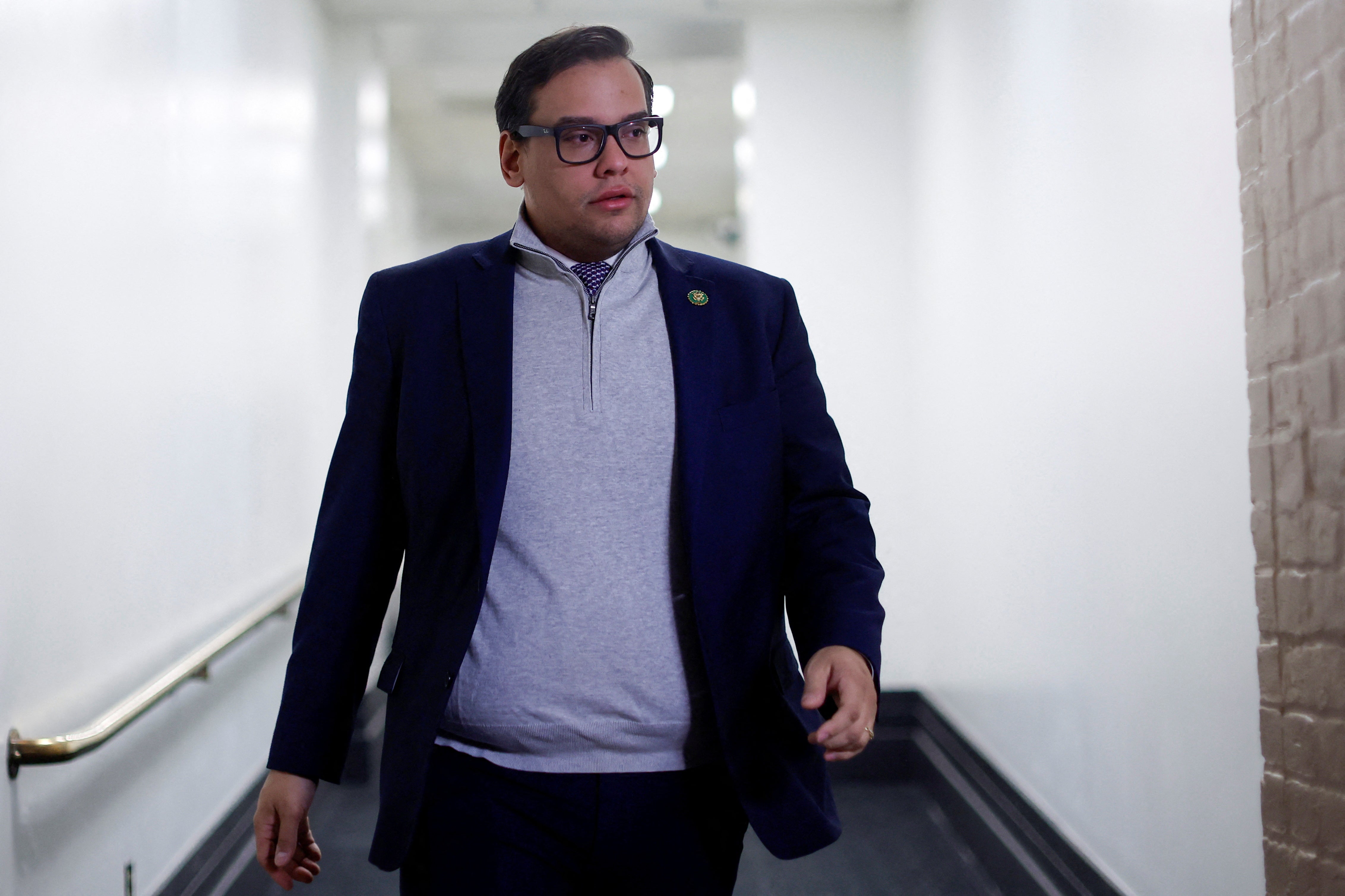 US Rep. Santos charged with fraud, money laundering