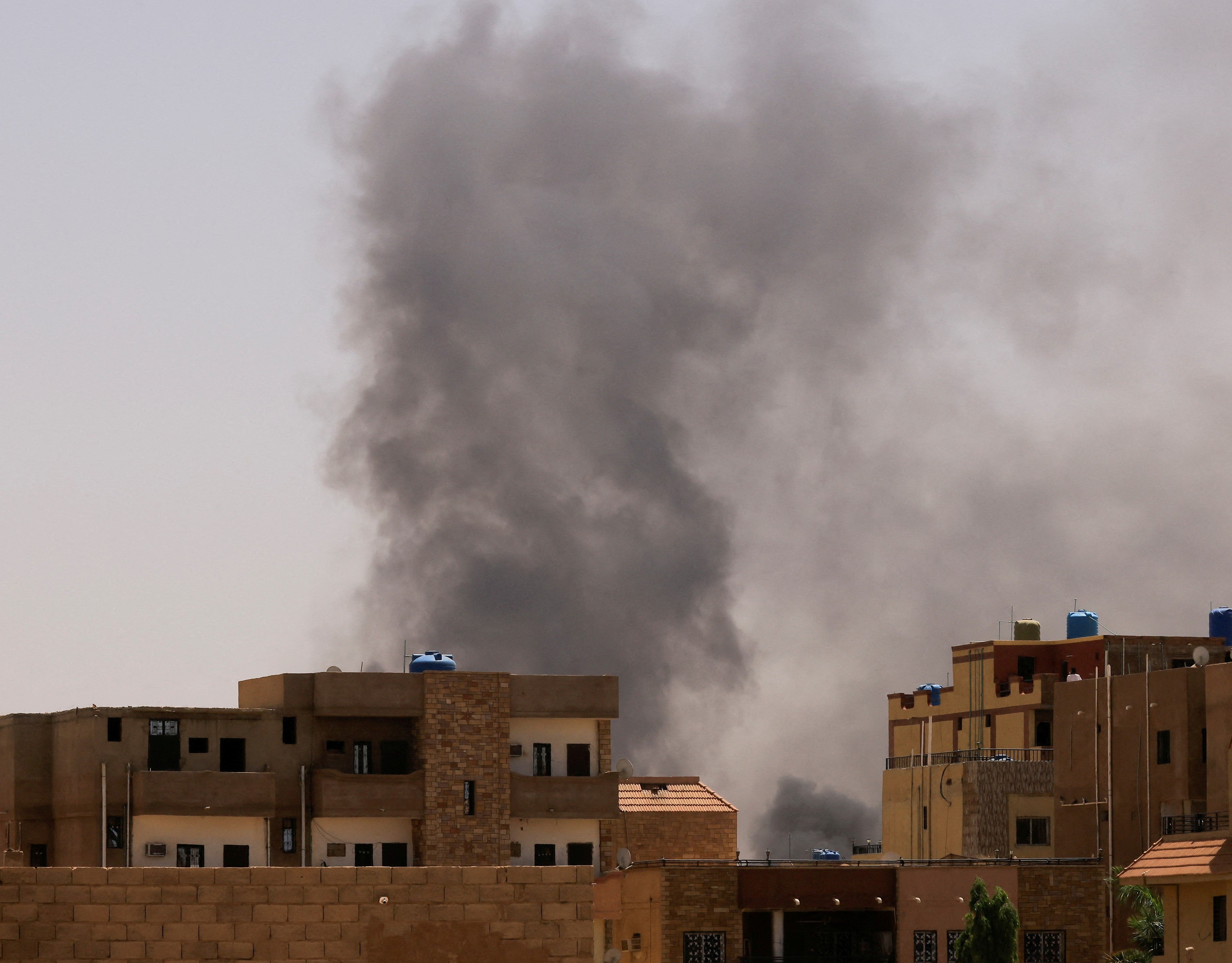 Smoke is seen rise from buildings during clashes between the paramilitary Rapid Support Forces and the army in Khartoum North, Sudan.