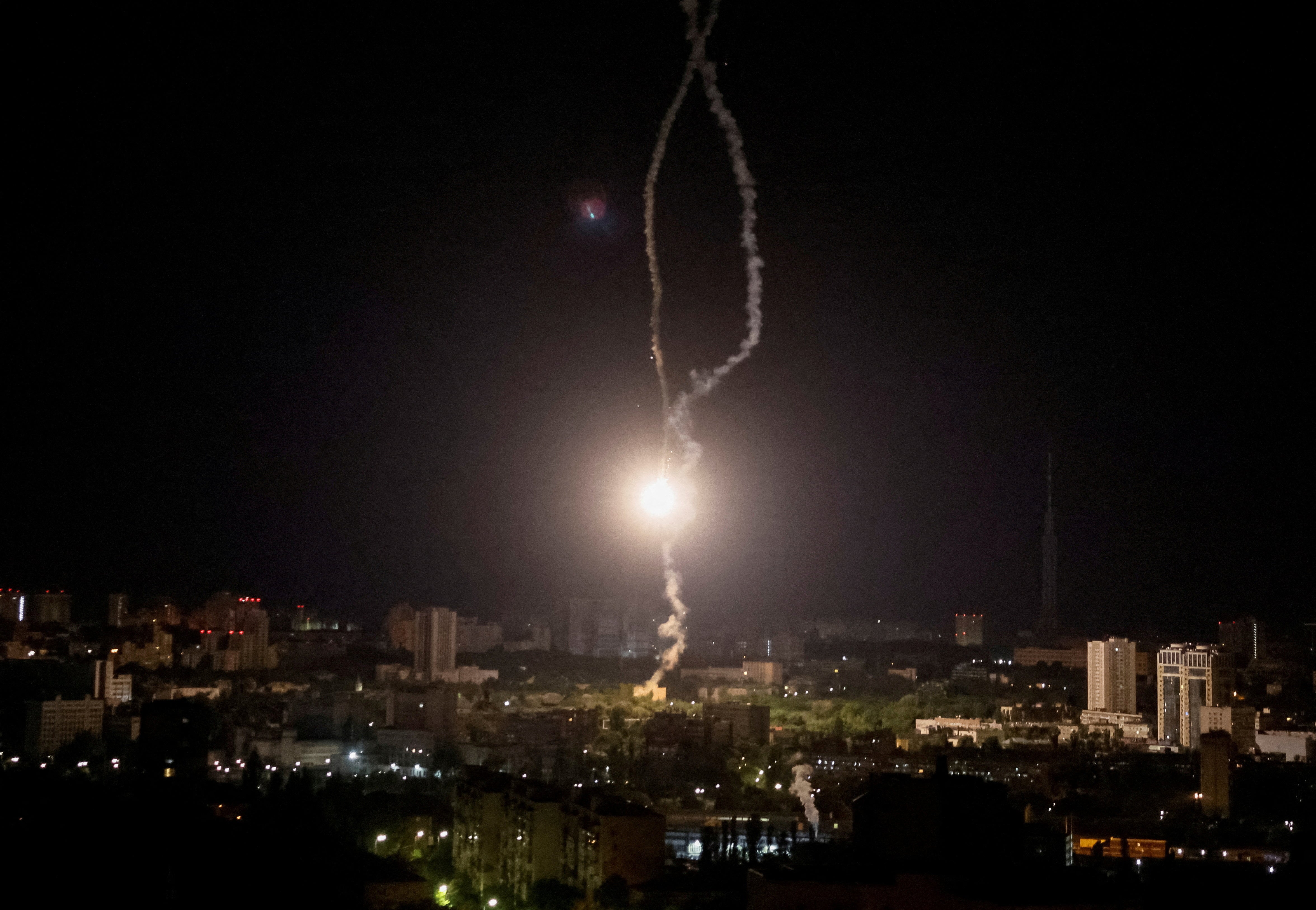 Explosion of a missile is seen in the sky over the Kyiv during a Russian missile strike