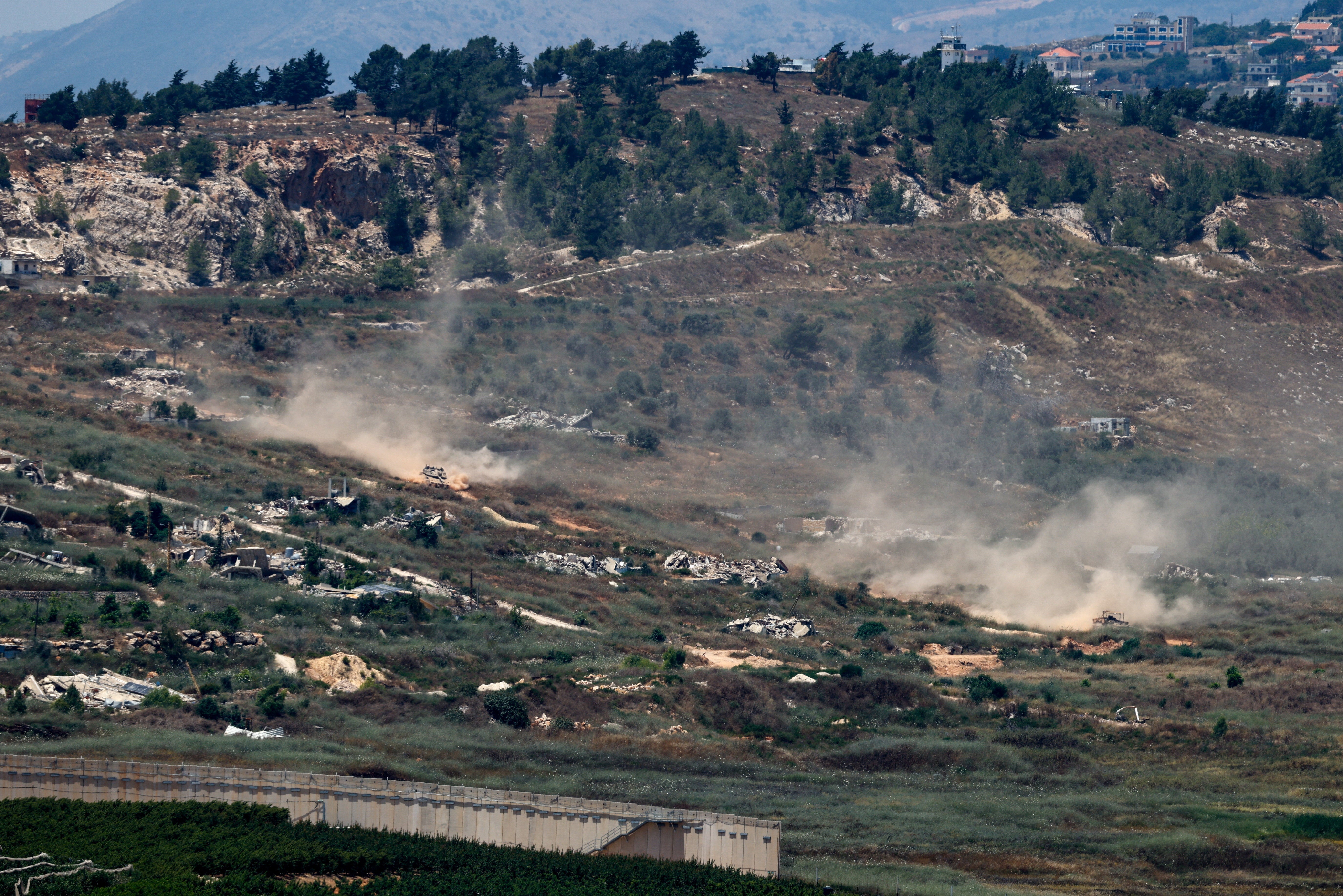 Israeli tanks manoeuvre in Lebanon, after Israel and Lebanon signed a framework agreement following U.S.-mediated talks, as seen from northern Israel, June 27, 2026. REUTERS/Amir Cohen
