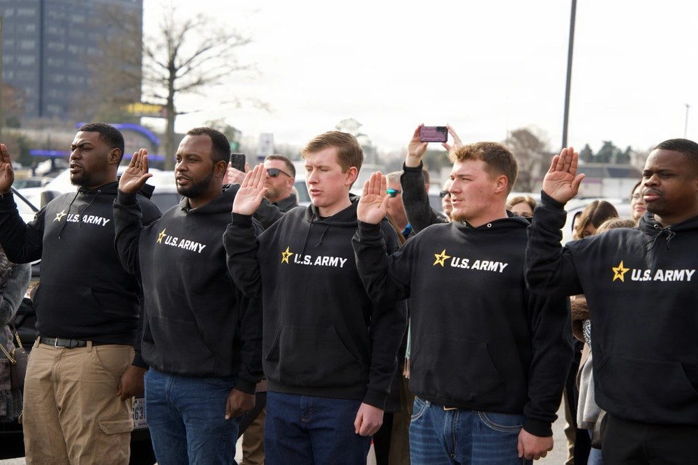 Future service members take the oath of enlistment during a multi-service swear-in ceremony in Newport News, Virginia, Jan. 5, 2026. U.S. military recruiting has rebounded sharply after years of recruiting challenges.