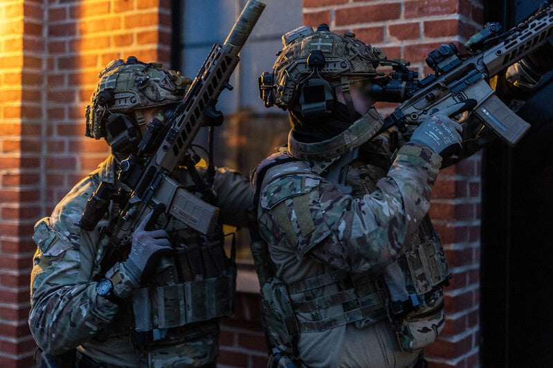 Operators from the Royal Danish Army’s Jaeger Corps prepare to clear a building during exercise Night Hawk 21