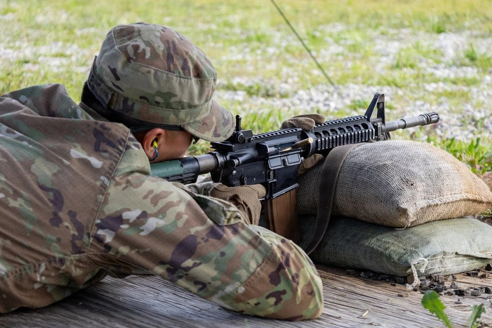 An Army ROTC cadet fires an M4 during Advanced Camp at Fort Knox, Kentucky, June 11, 2026. The Army recently rescinded a planned minimum standardized-test requirement for incoming ROTC cadets while the proposal undergoes further review.