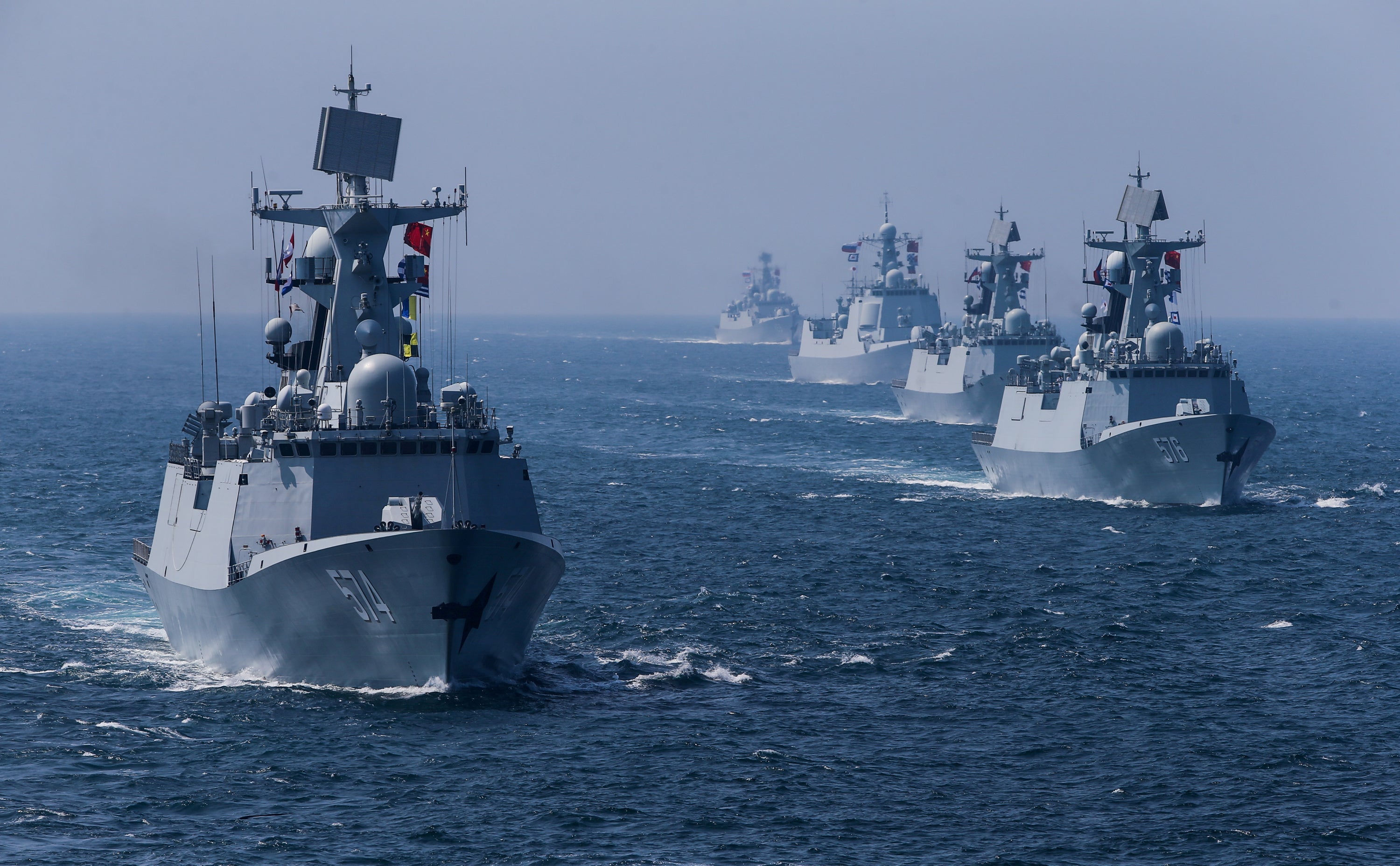 A fleet of ships sail out at sea as China and Russia's naval joint drill concludes in Zhanjiang, Guangdong Province, China