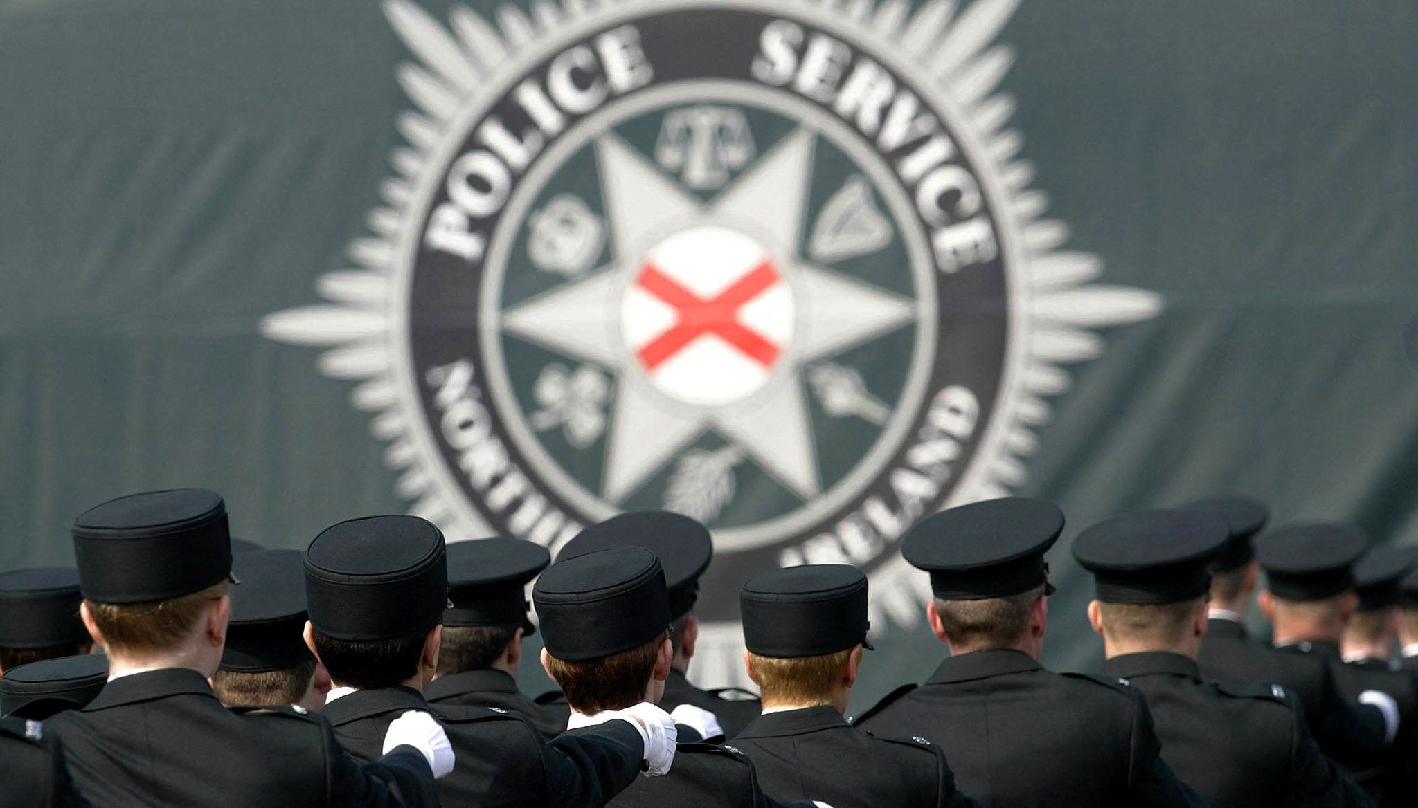 Northern Irish police arrest three over shooting of detective