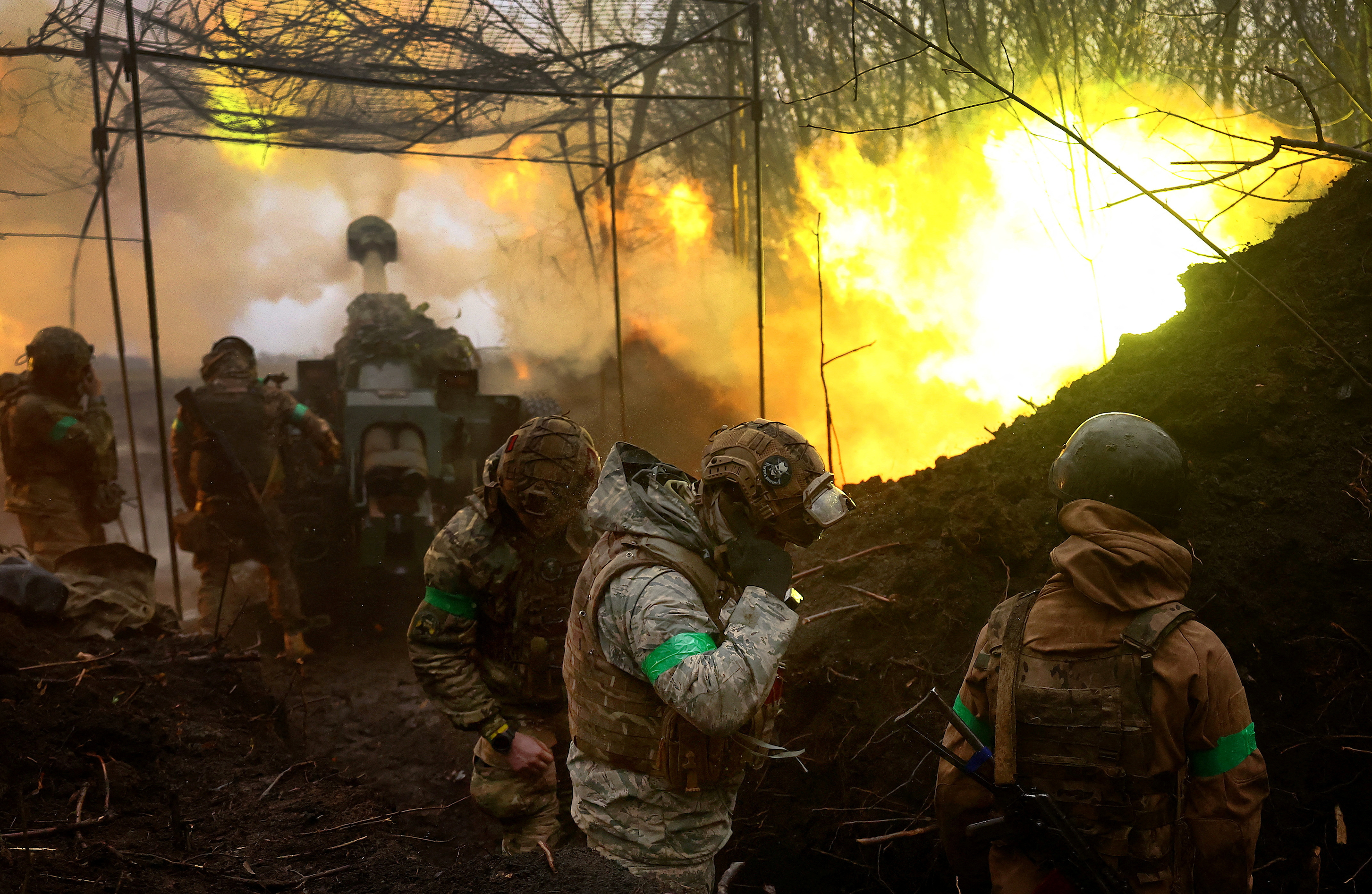 Ukraine forces pull back as Russia mounts “re-energized” Bakhmut assault, UK says