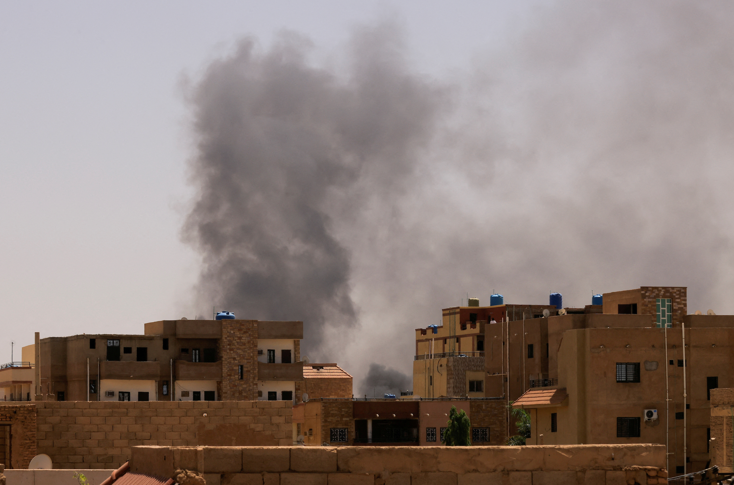 Smoke is seen rise from buildings during clashes between the paramilitary Rapid Support Forces and the army in Khartoum North, Sudan
