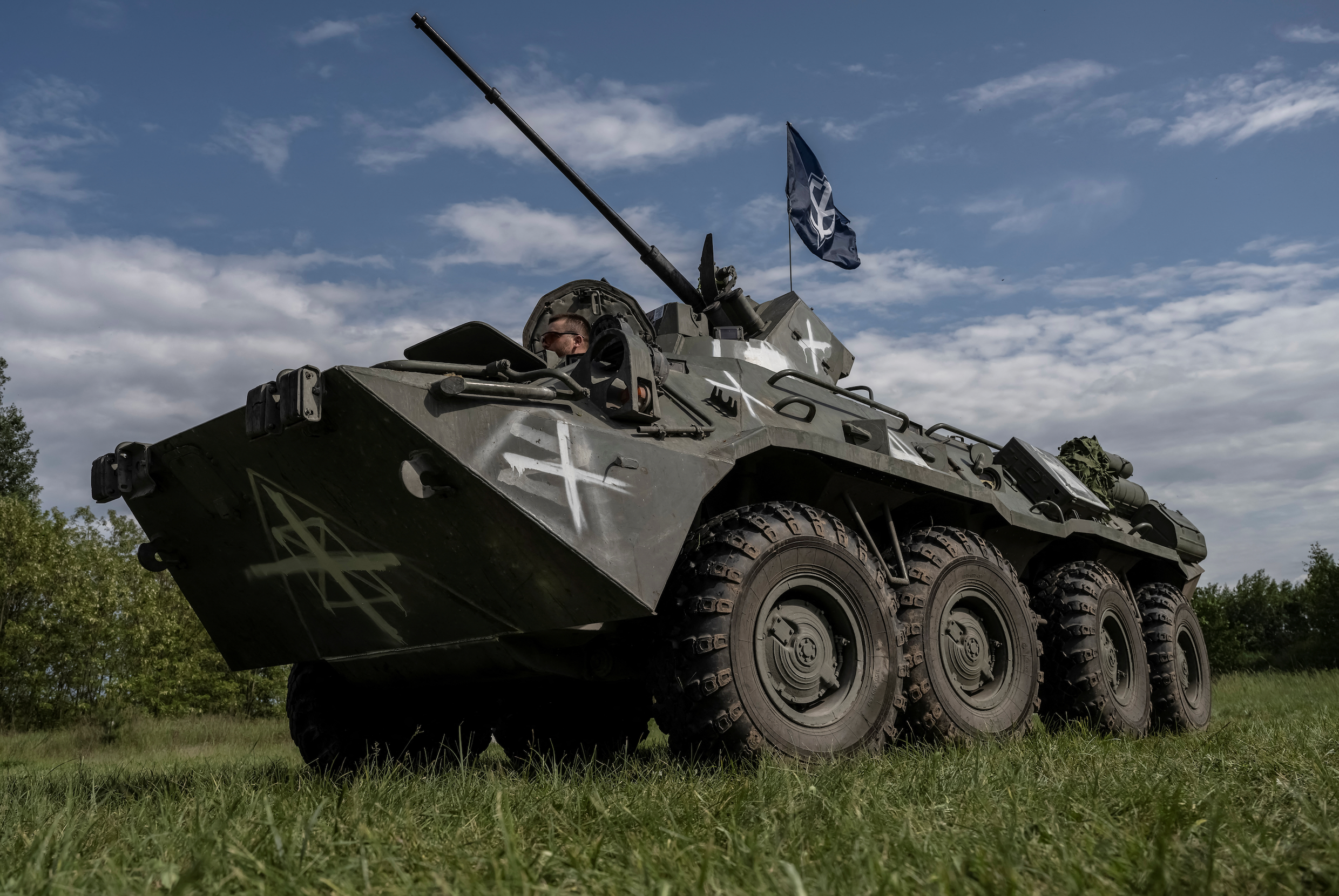 Members of the Russian Volunteer Corps are seen, amid Russia's attack on Ukraine, near the Russian border