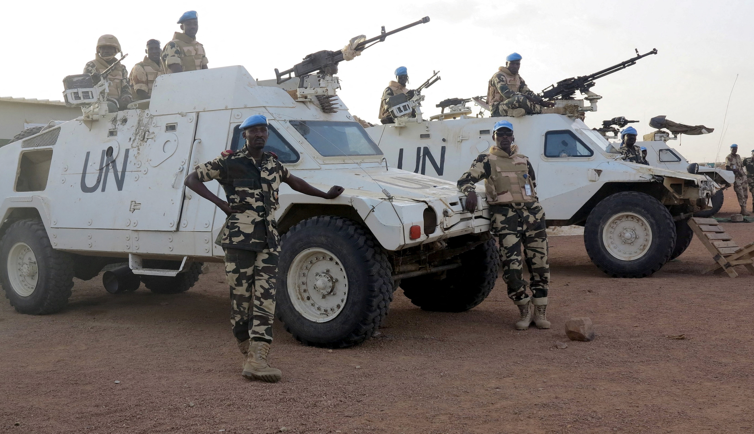 Chadian peacekeepers stand guard at the Minusma peacekeeping base in Kidal, Mali