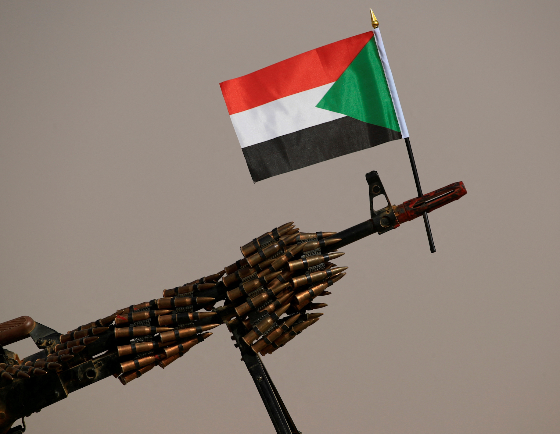 A Sudanese national flag is attached to a machine gun of Paramilitary Rapid Support Forces (RSF) soldiers