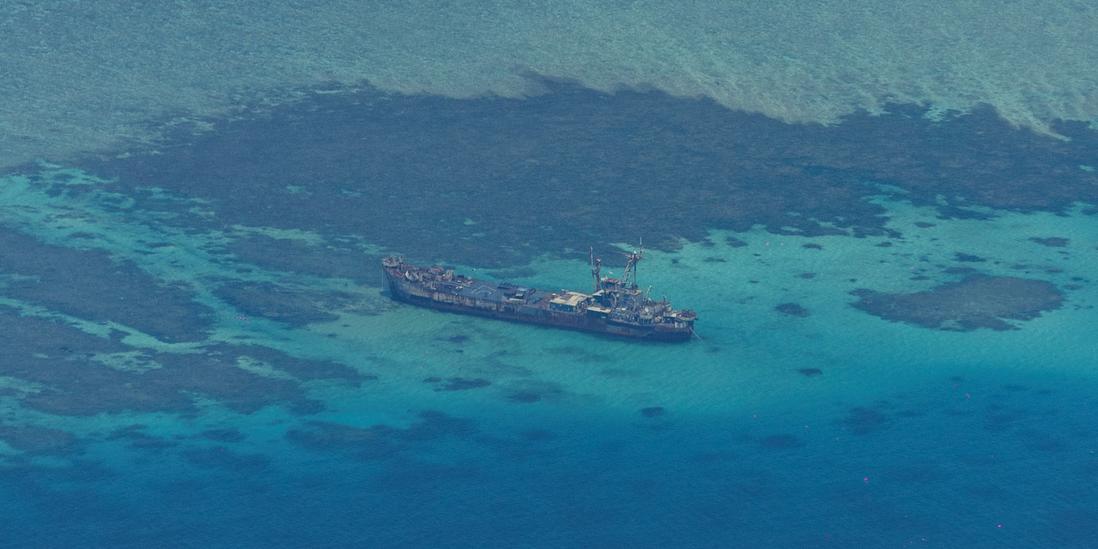 China, Philippines renew dispute over static warship