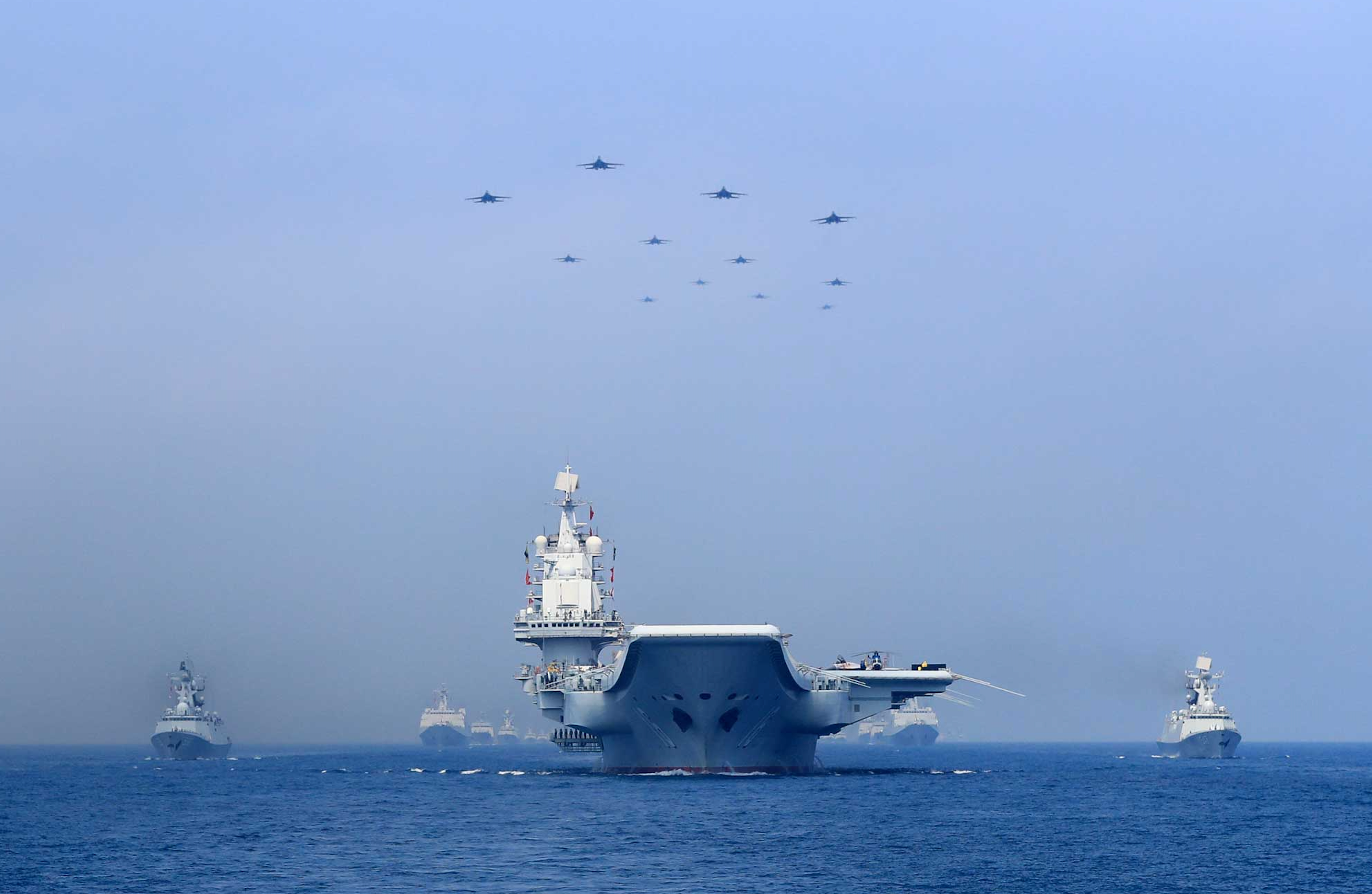 China rolls out upgrades for military aircraft, vessels