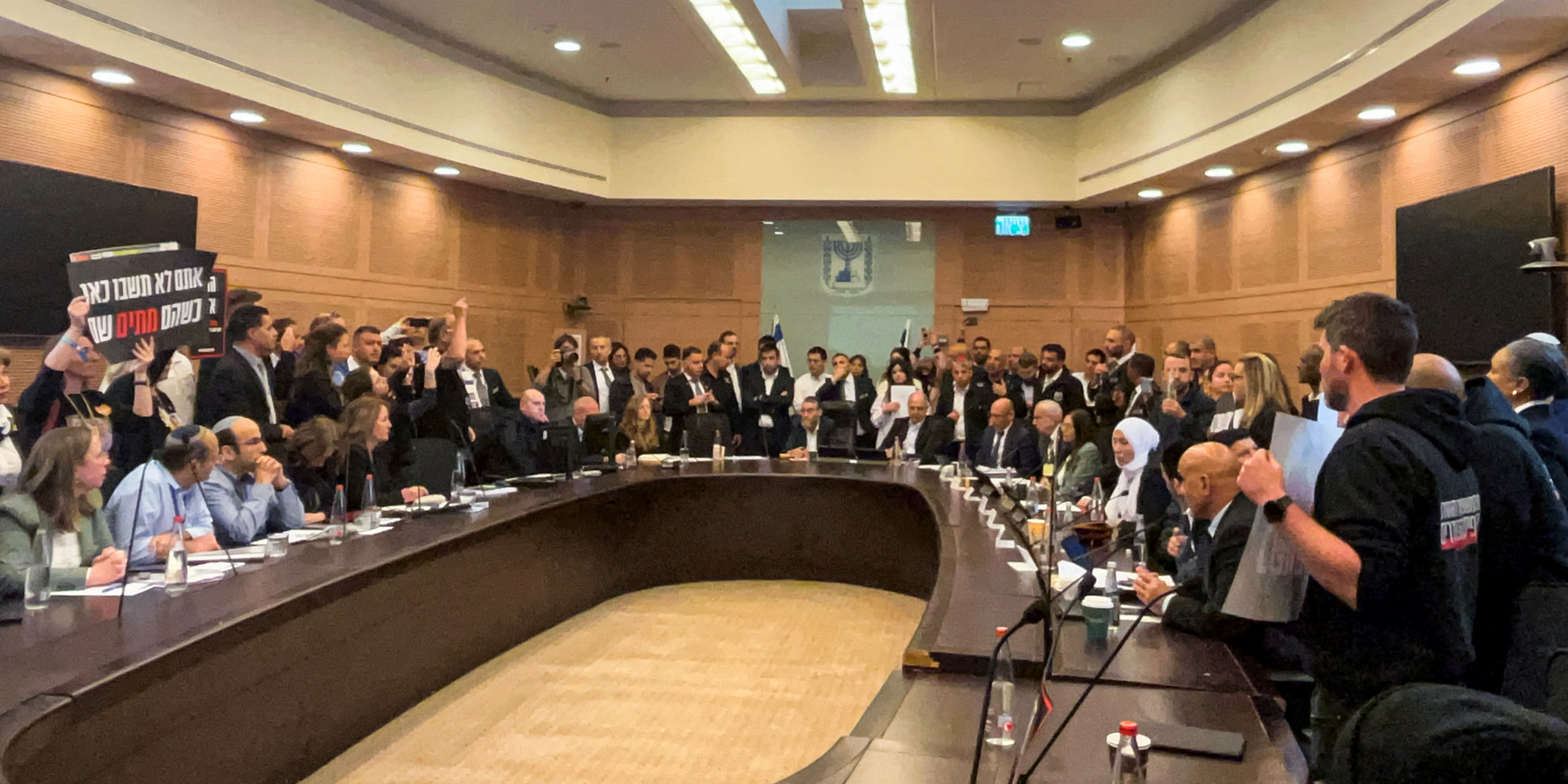 Gaza hostage relatives burst into Israeli parliament, calls for action mount