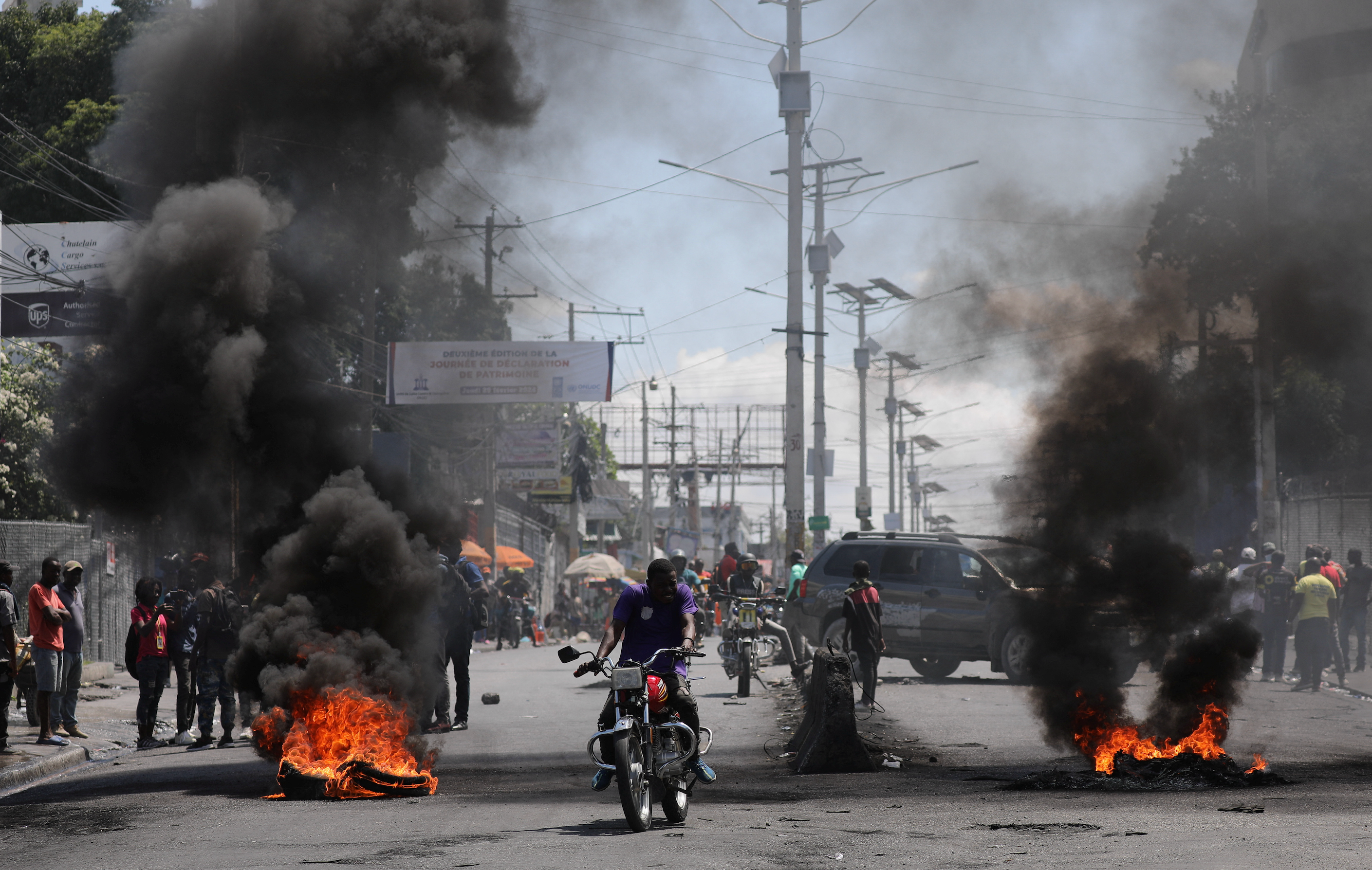 US military airlifts embassy personnel from Haiti, bolsters security