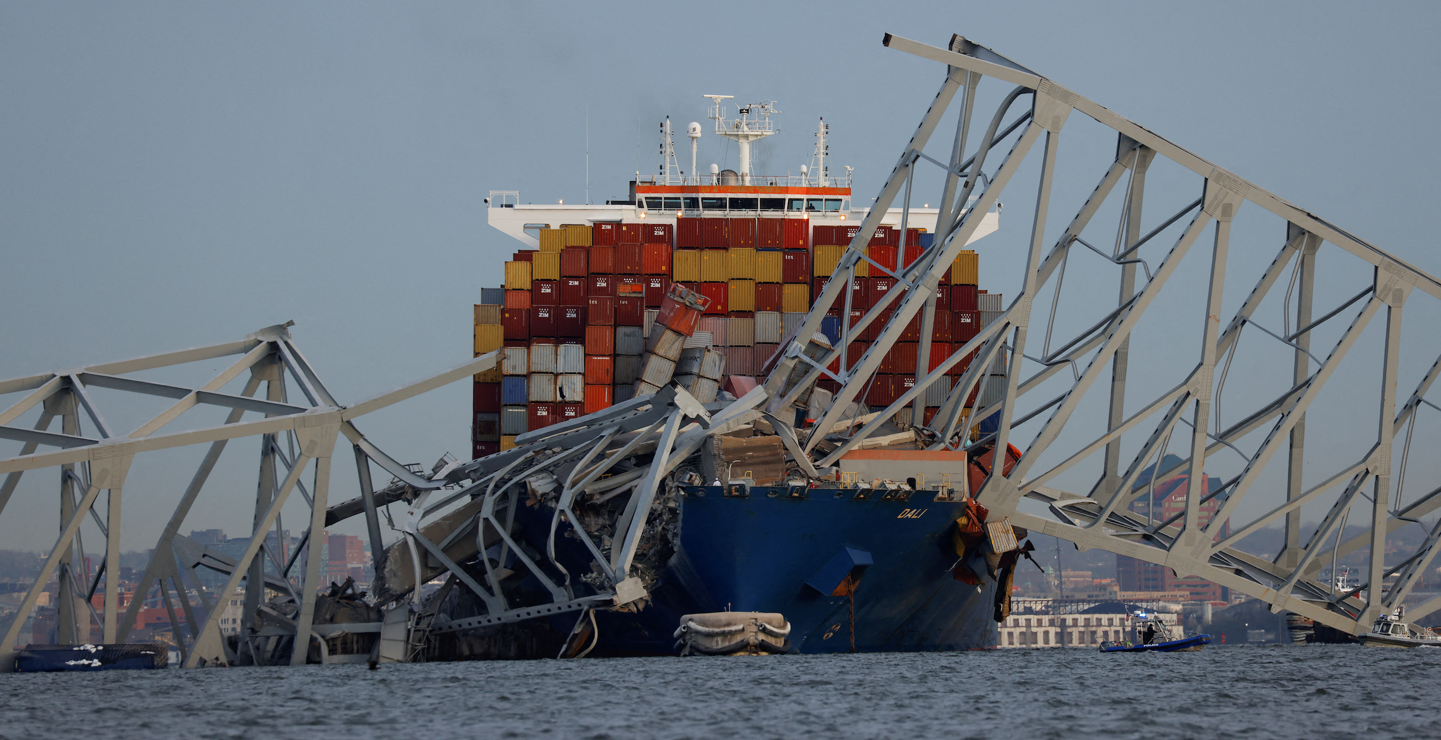 Baltimore bridge collapses after ship collision, sending vehicles into water