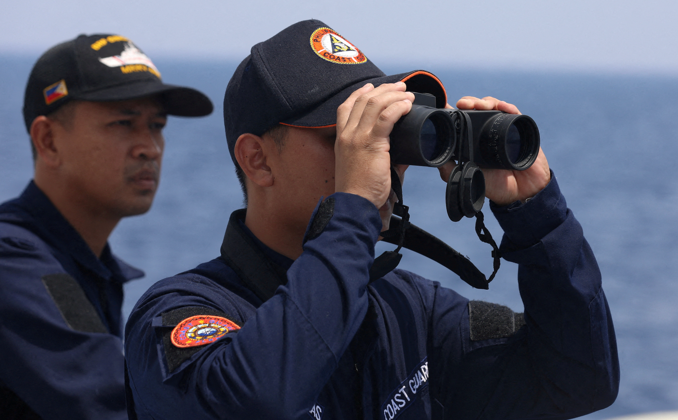 Philippines sends ships to disputed atoll where China building “artificial island”