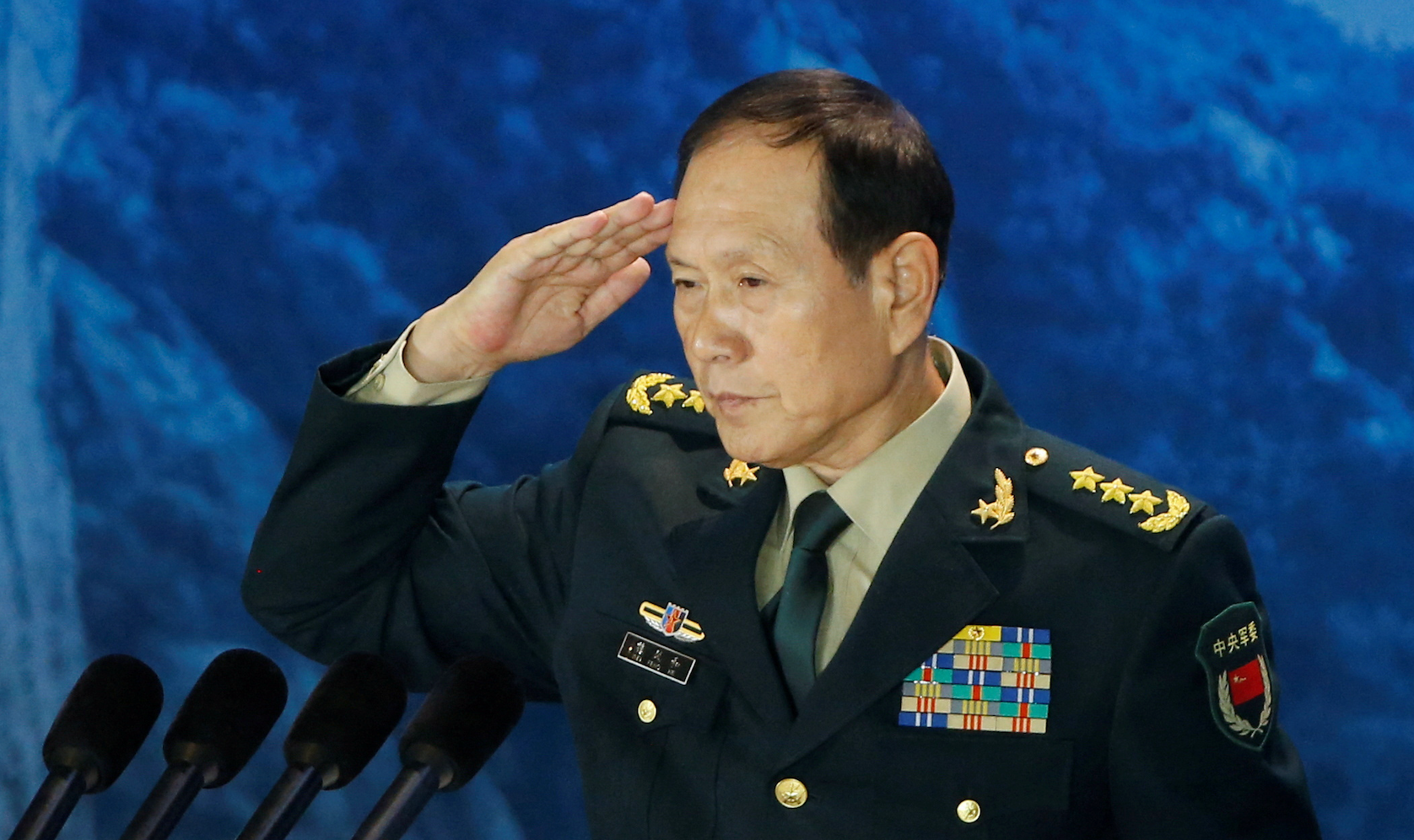 China's Communist Party expels two former defense ministers for corruption