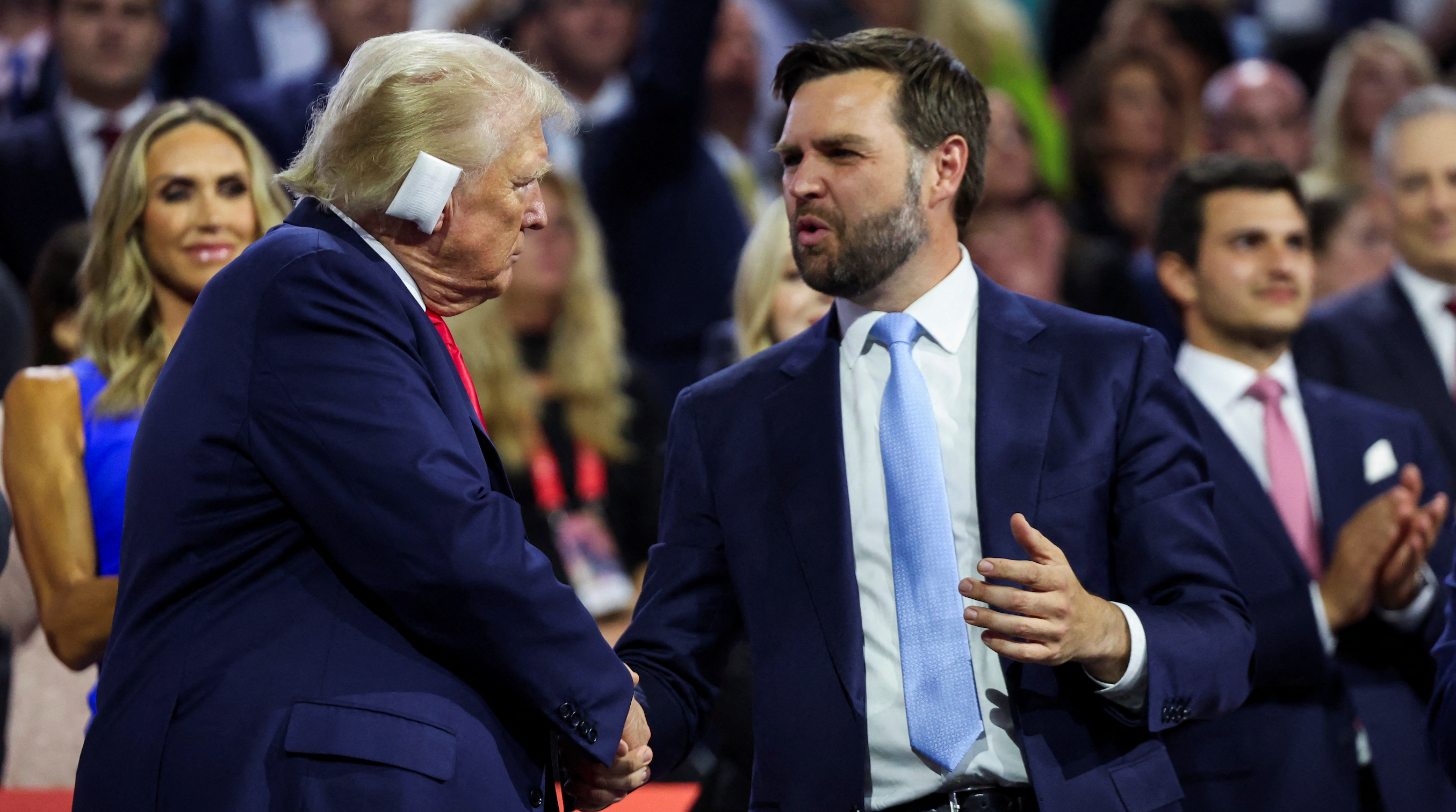 Trump appears with bandaged ear at Republican convention, names Vance as running mate