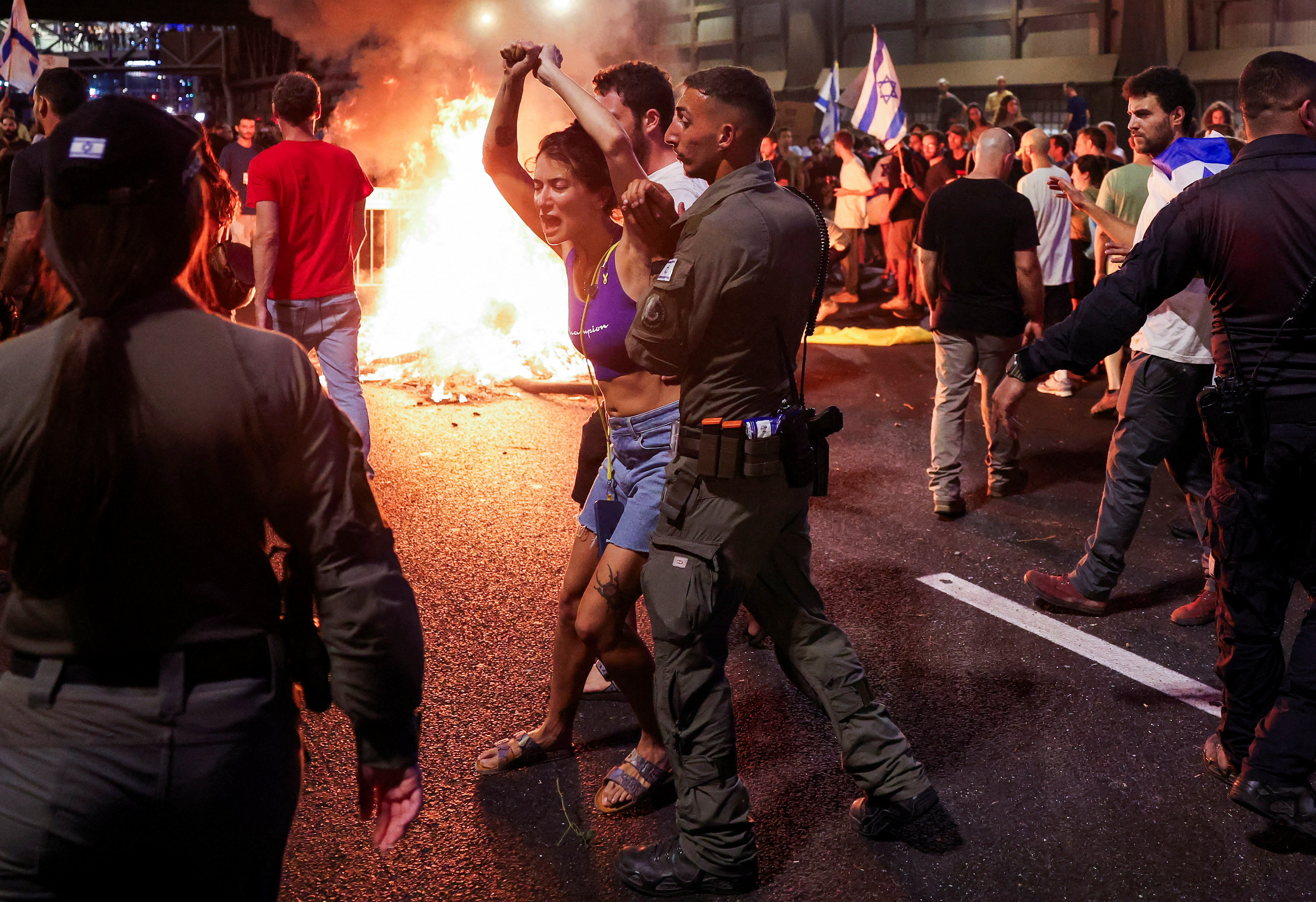 Israelis protest to demand Gaza deal after six hostages found dead