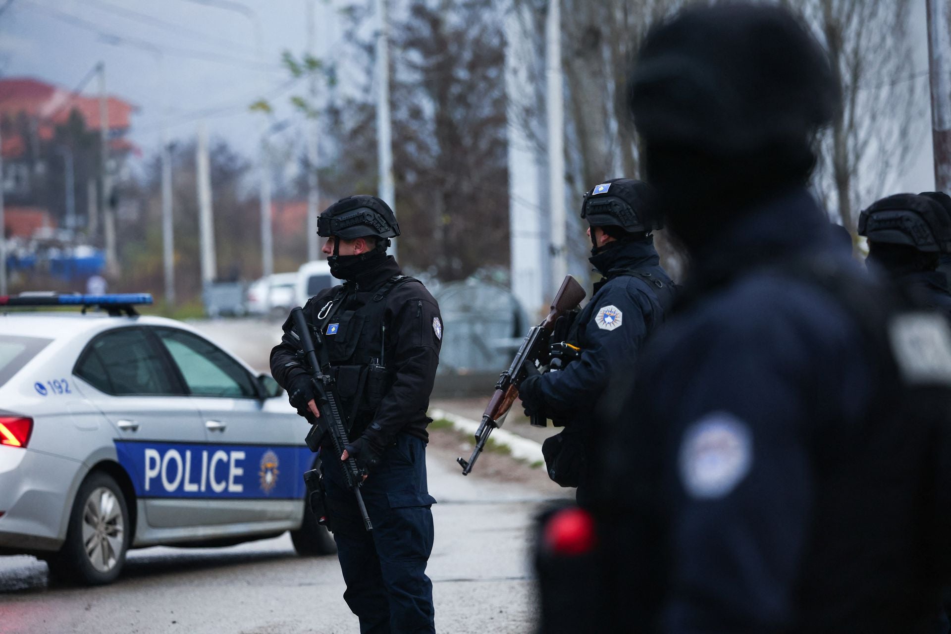 Kosovo police officers patrol an area in the northern part of the ethnically-divided town of Mitrovica, Kosovo